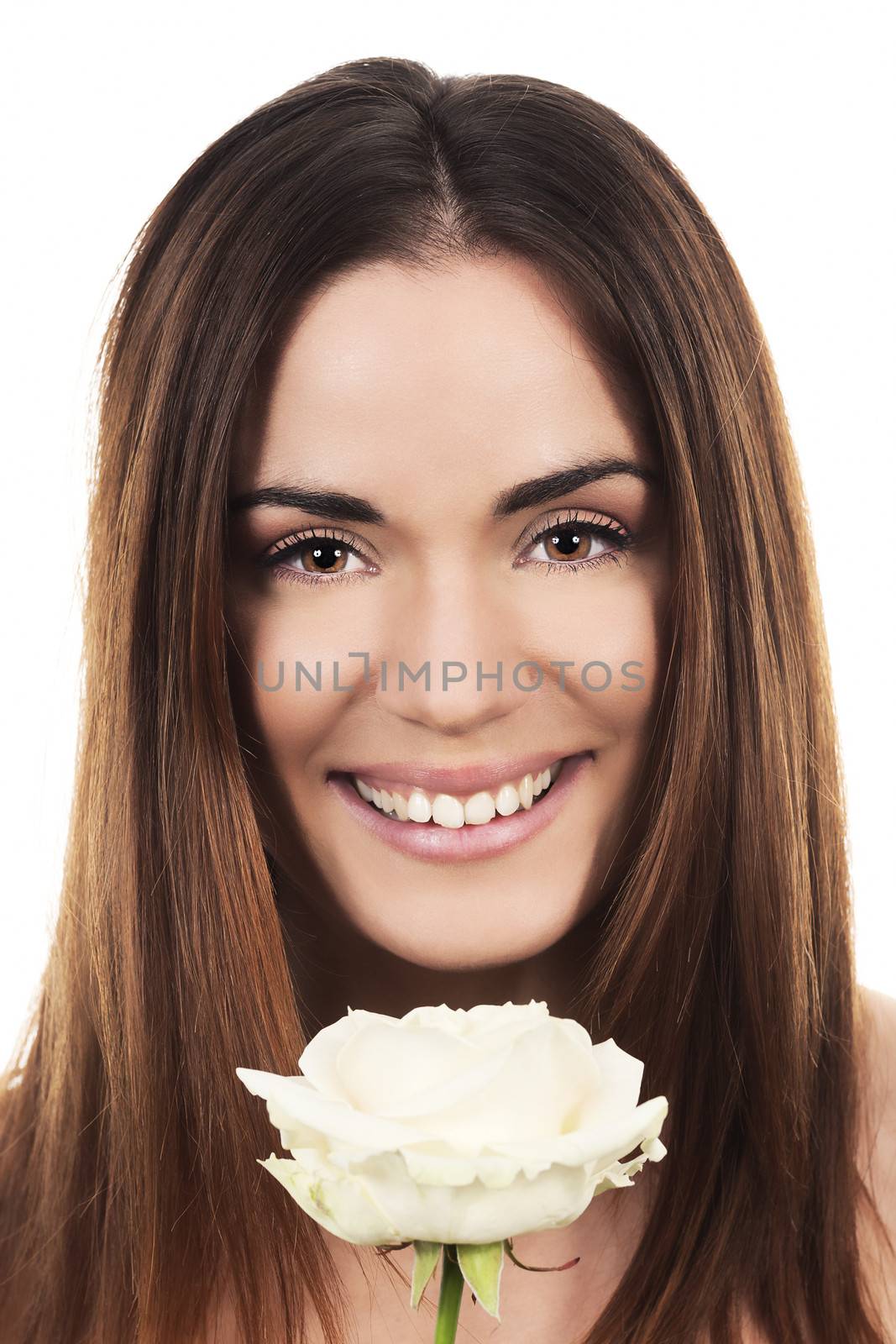 cute woman with white rose in studio