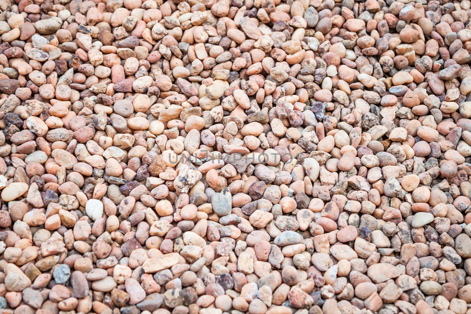 Brown pebble floor background texture by punsayaporn