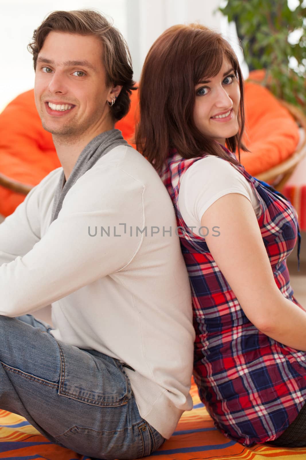Young beautiful caucasian couple at home
