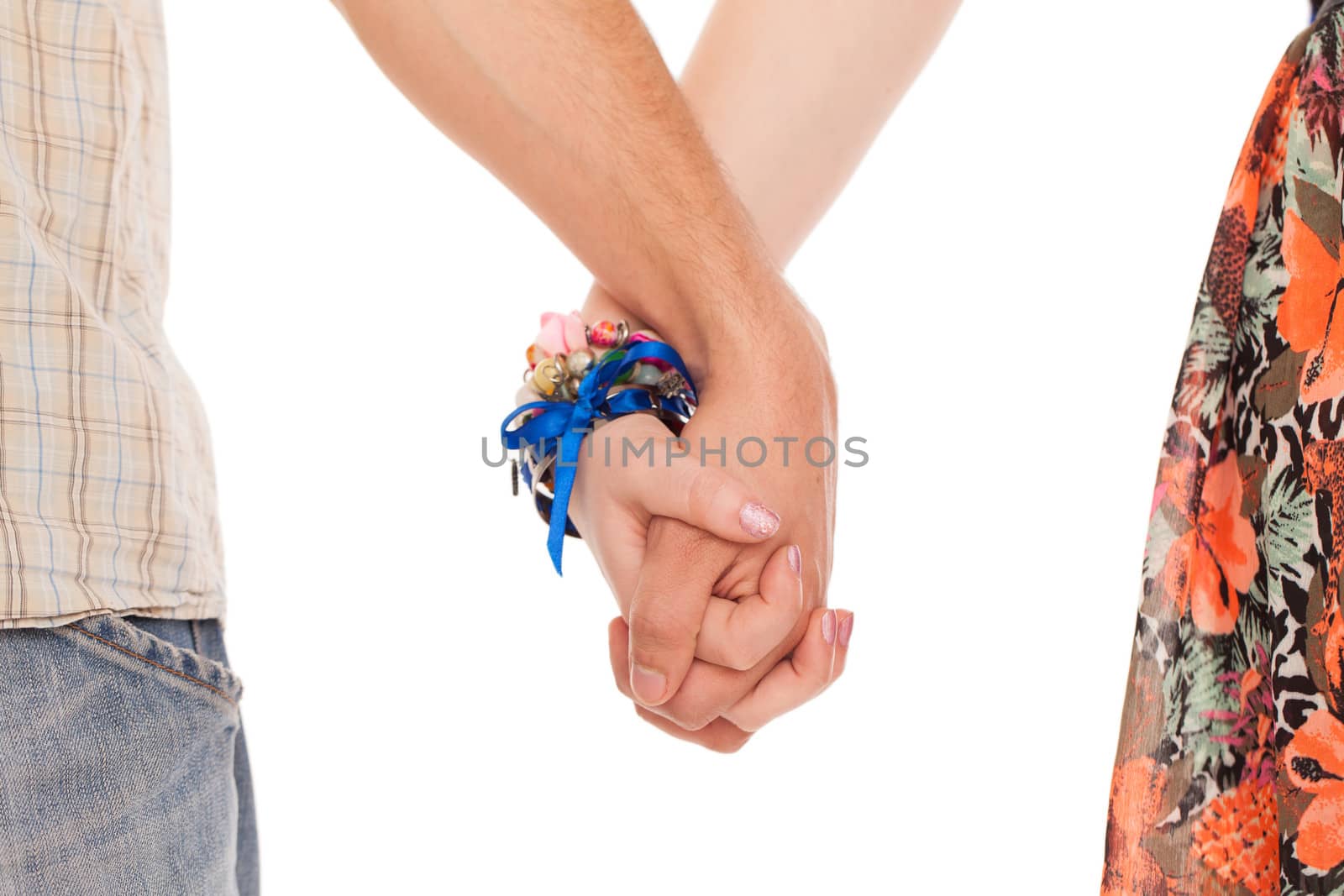 Hands together of romantic caucasian couple over white background