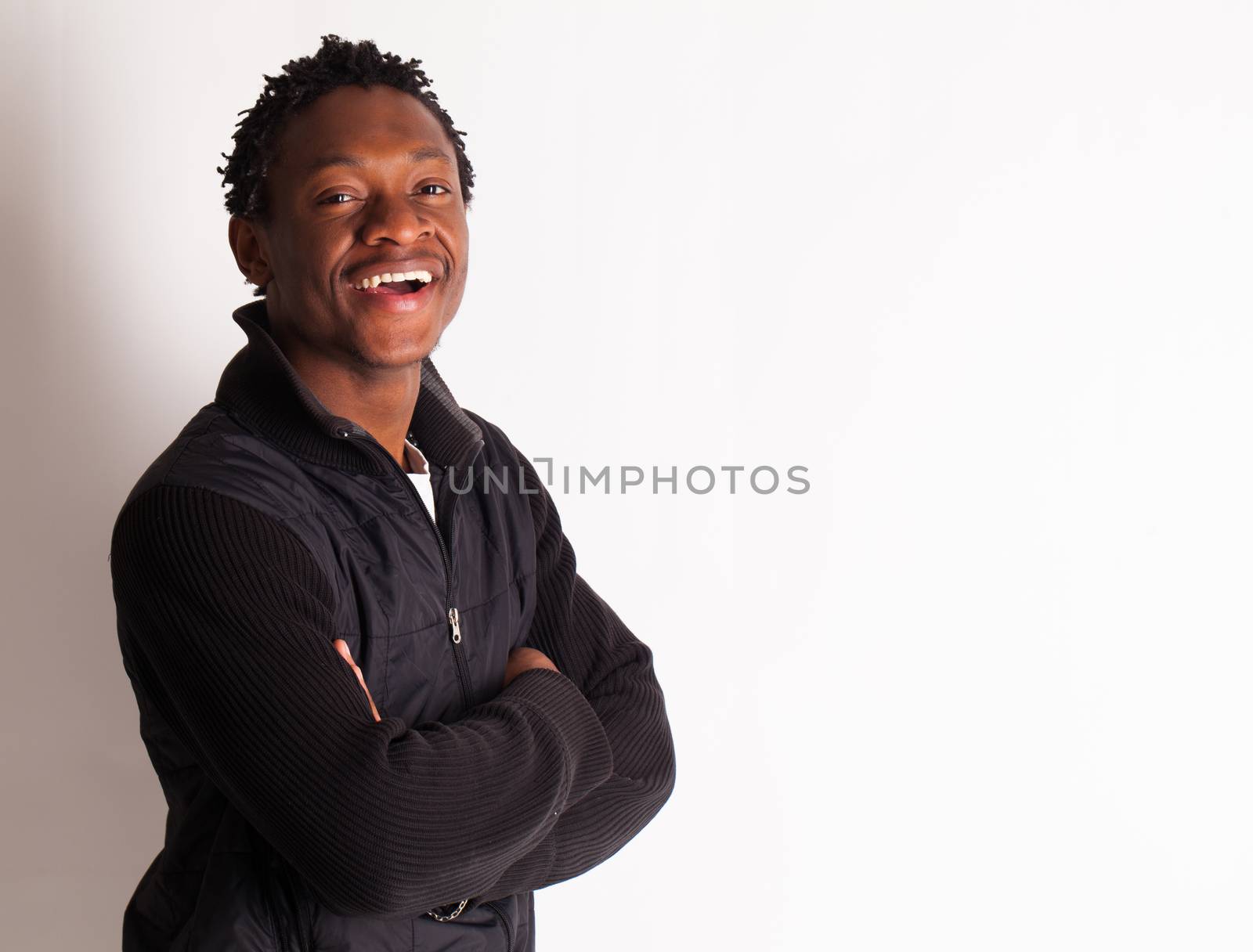 Handsome young black guy over background