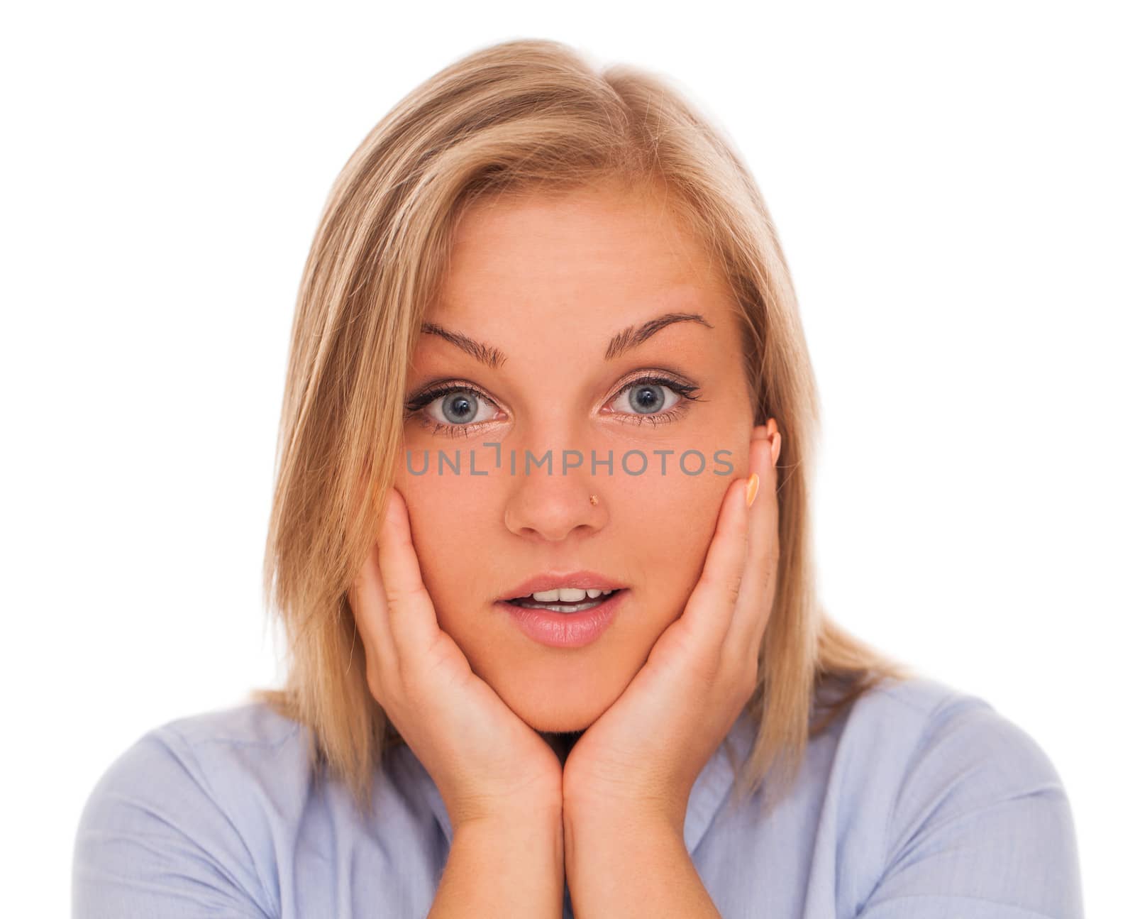 Closeup portrait of young blond caucasian woman surprised over white background