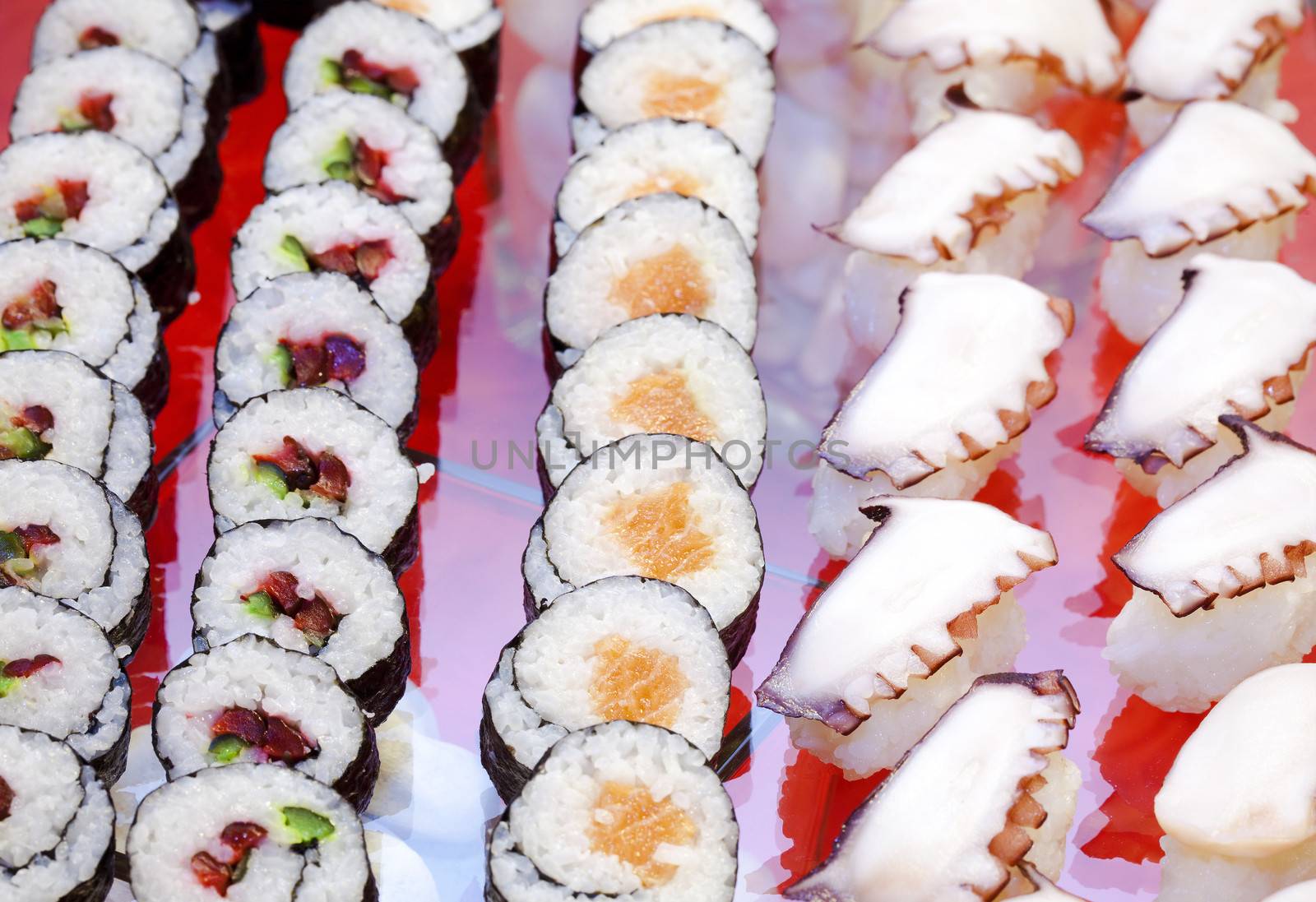 traditional japanese cuisine- sushi rolls served at a party