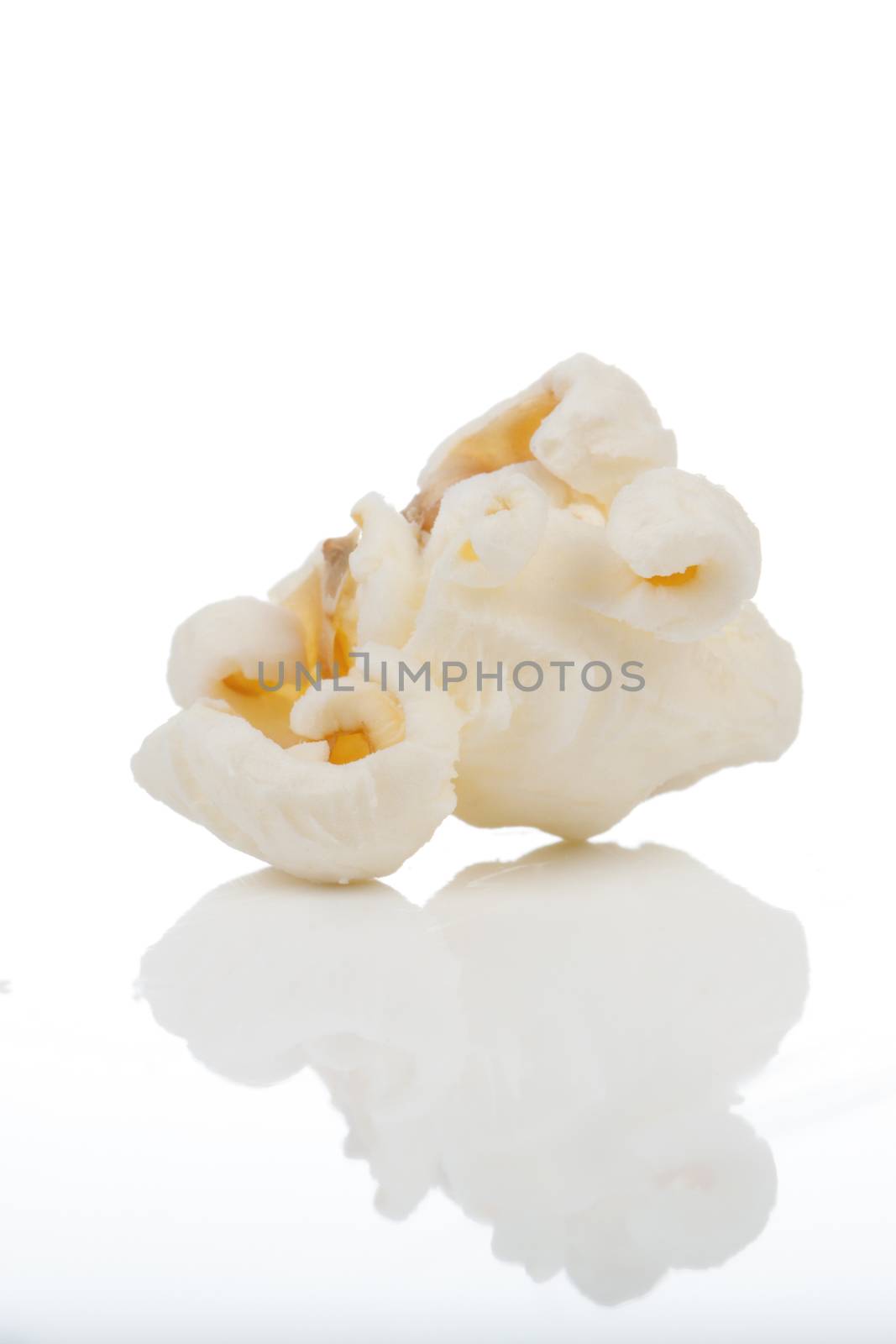 Popcorn isolated on white by motorolka