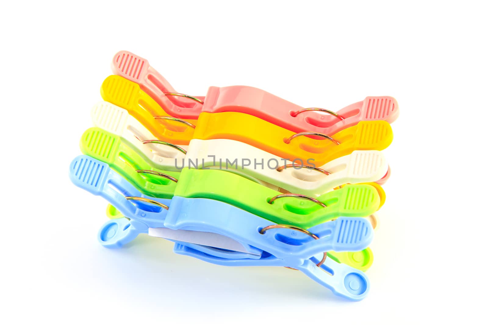 Colorful Clothes clips on white back ground
