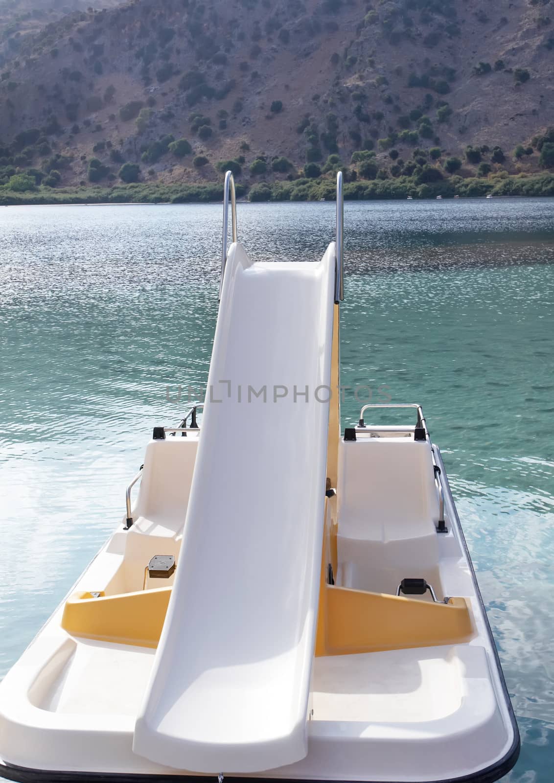 Pedal boat in lake .