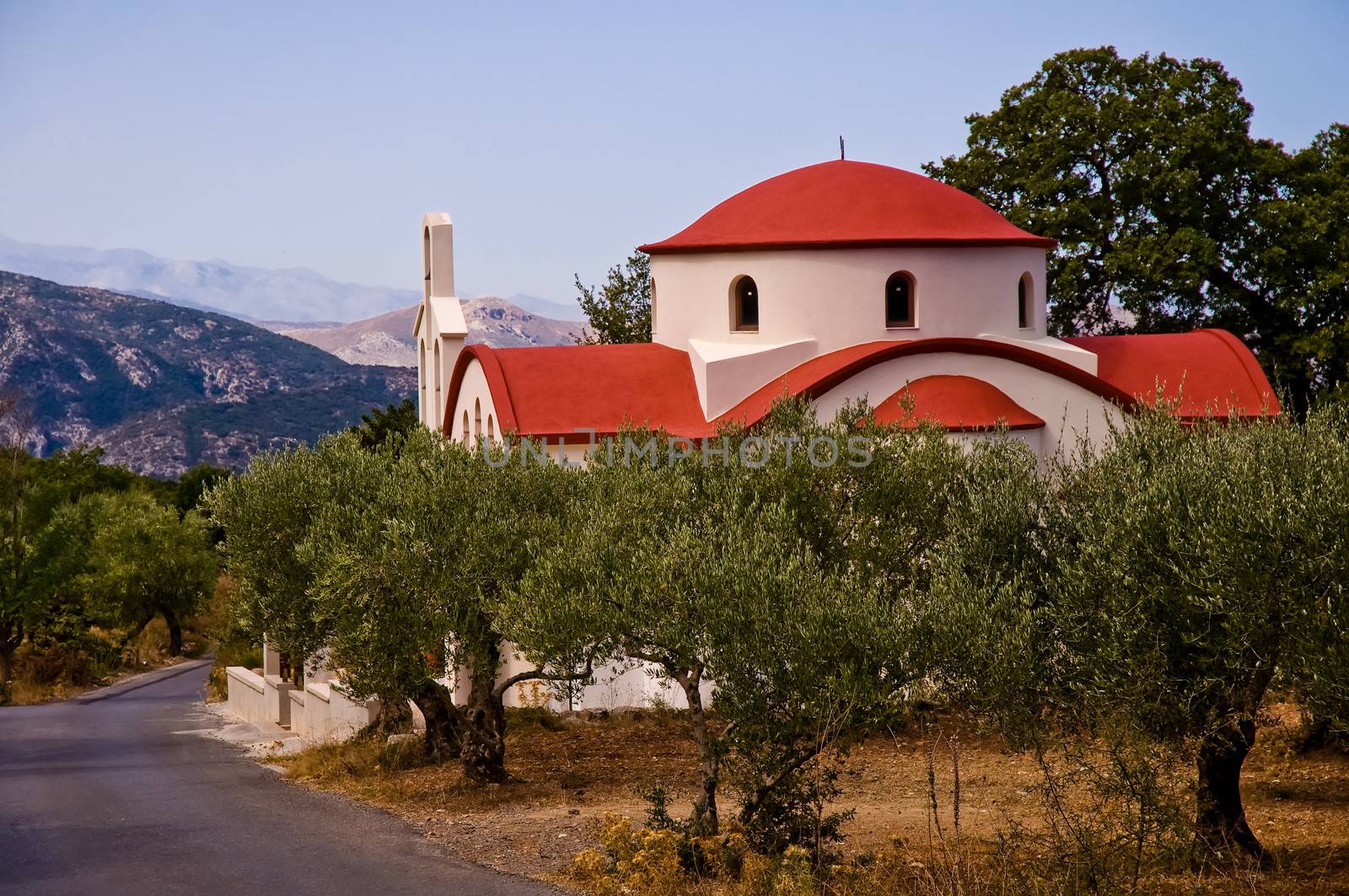 Mountain landscape with Greek church .