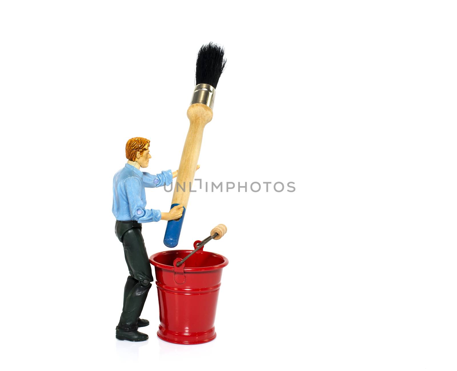 man with paint brush and red bucket