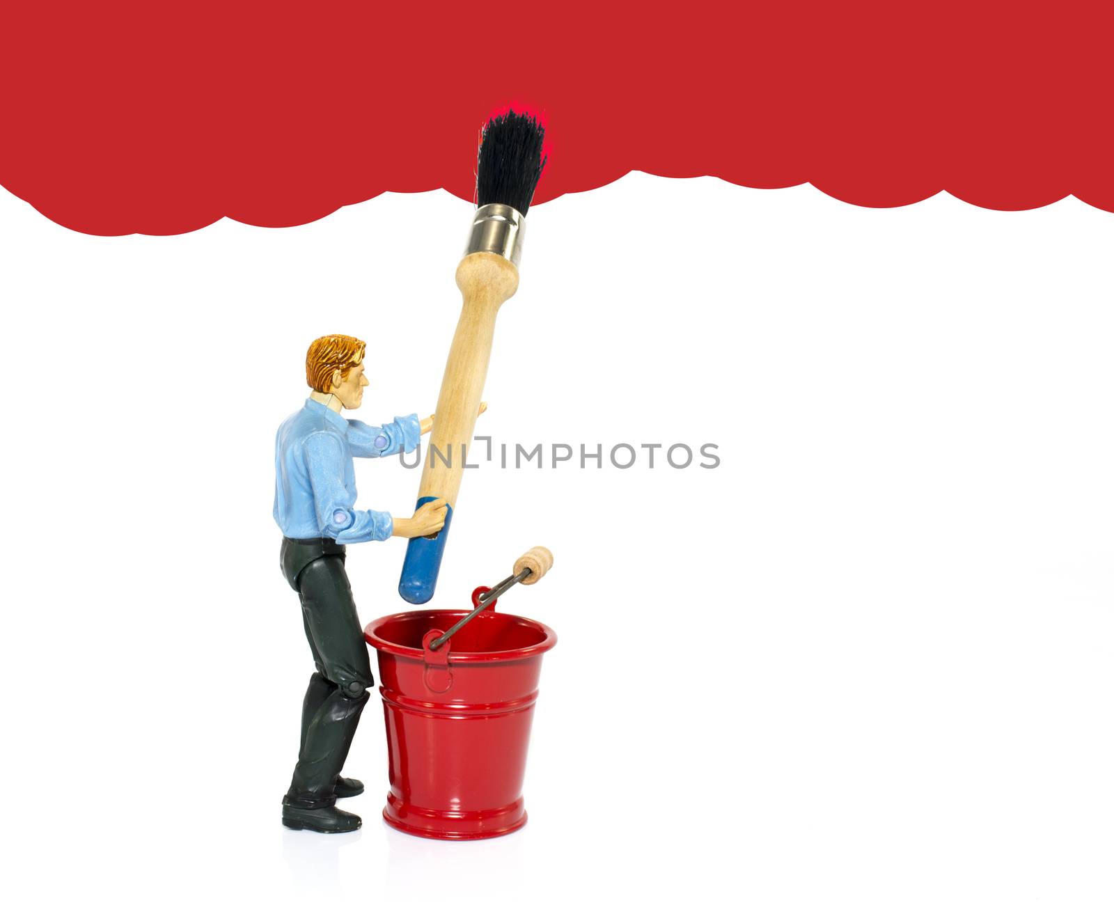 man with paint brush and red bucket
