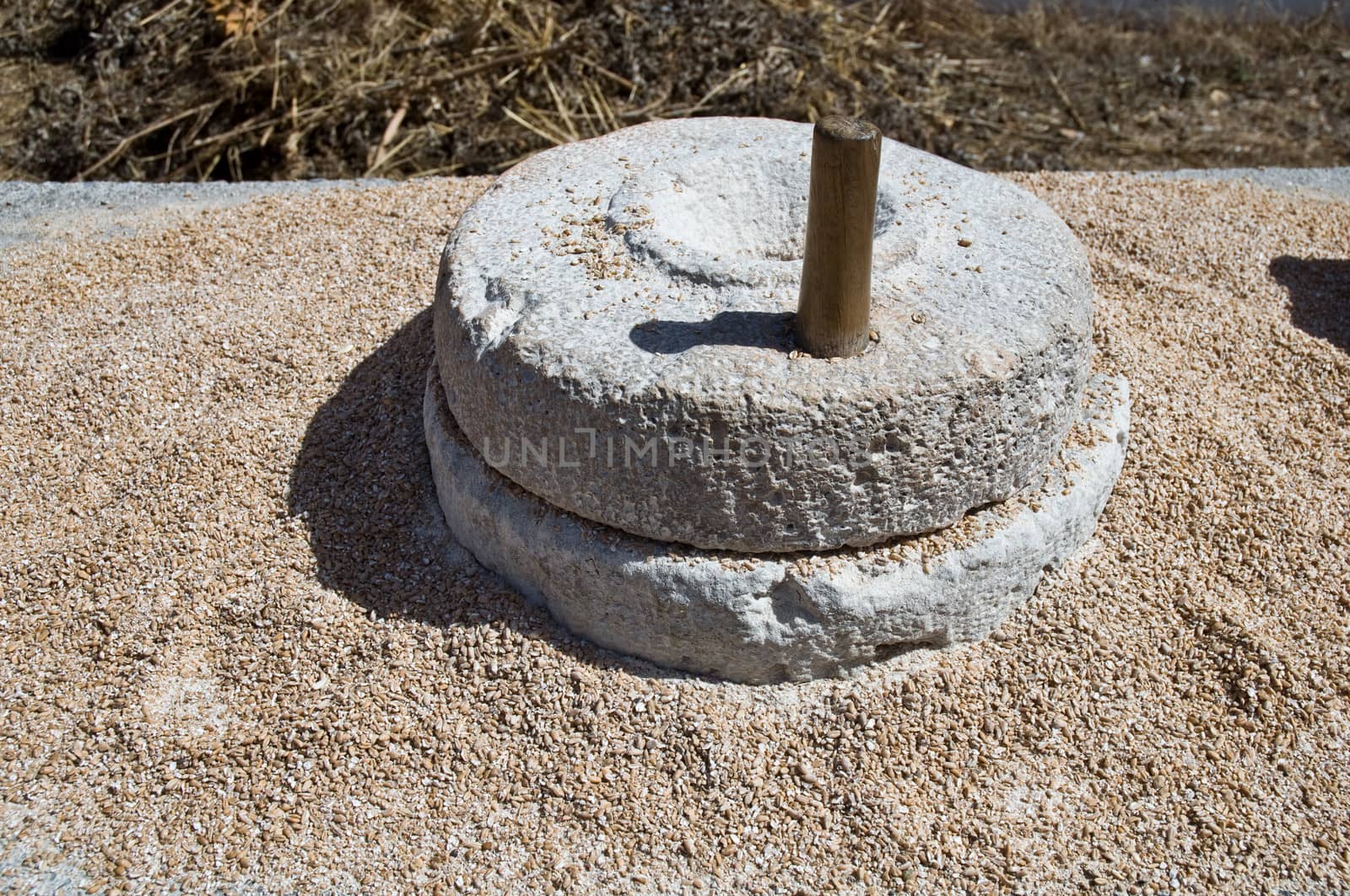 The ancient, stone, hand grain mill.