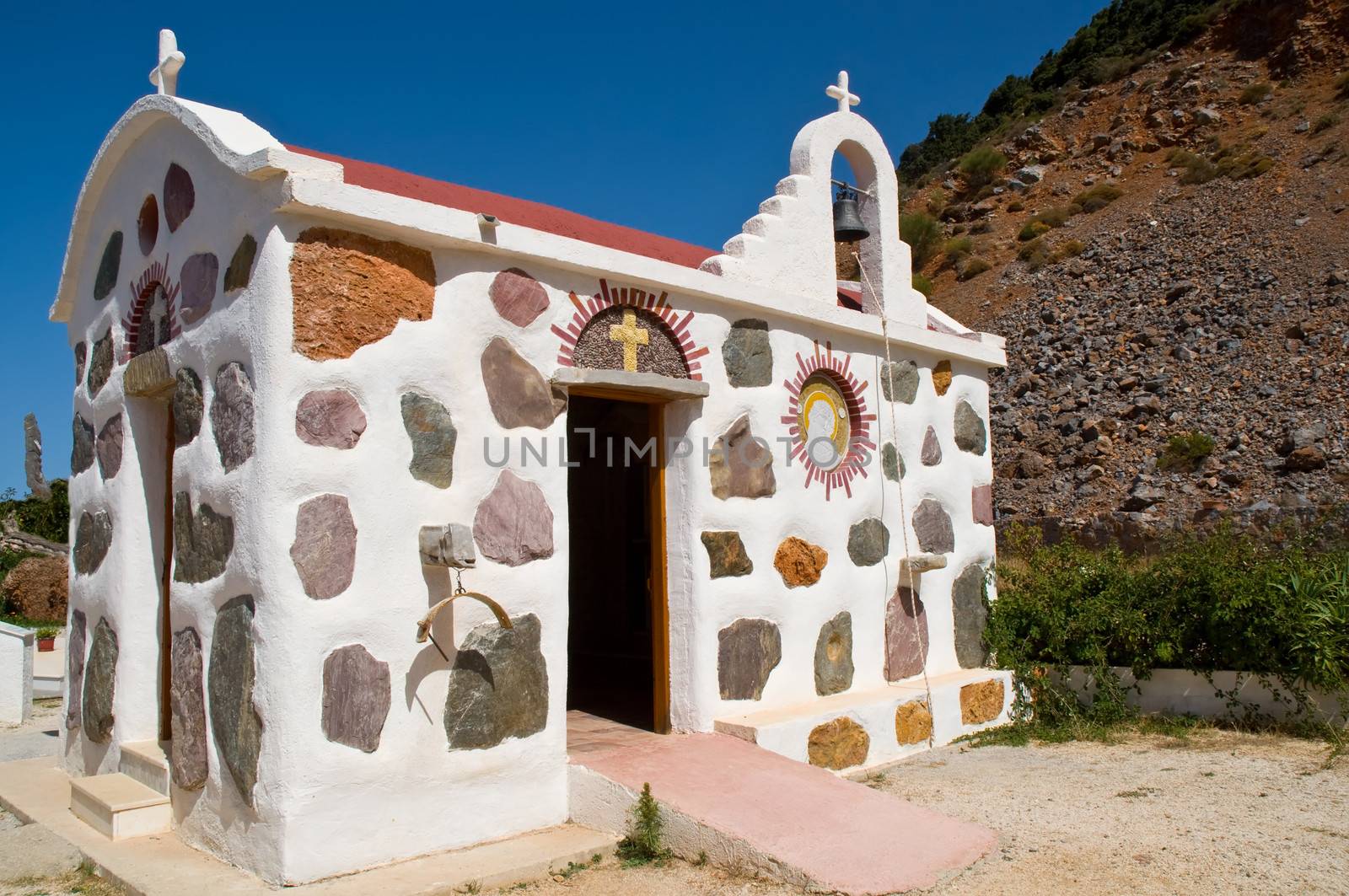 Mountain landscape with Greek church .