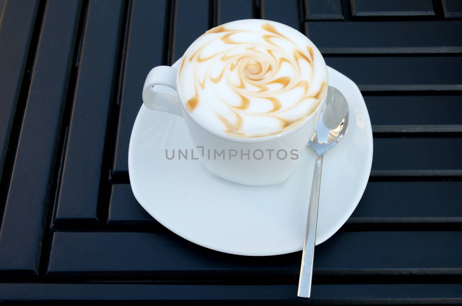 Hot coffee on table in cafe