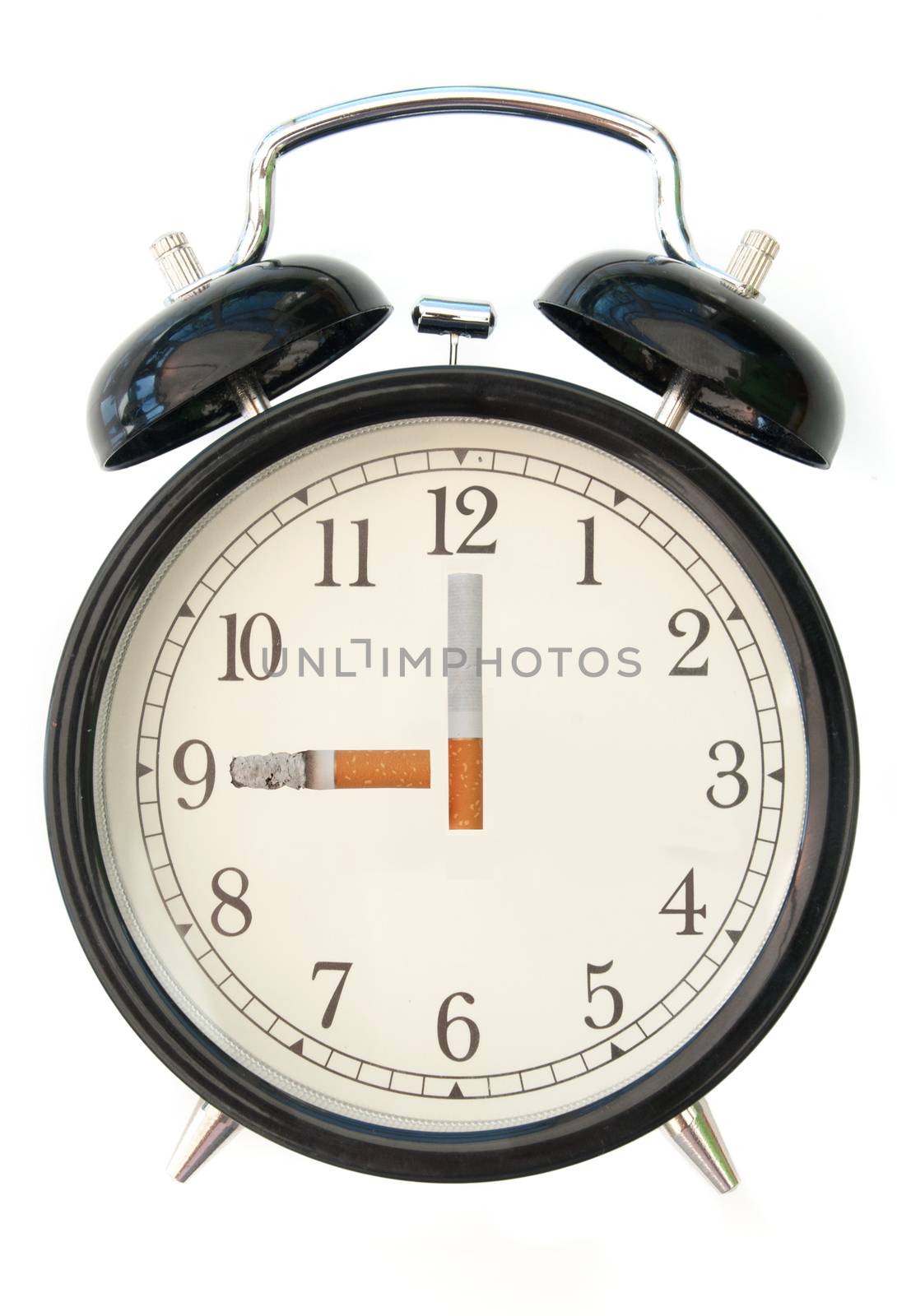 Cigarette hour and minute hands on an alarm clock symbolising 'time to quit' or a smoking habit  