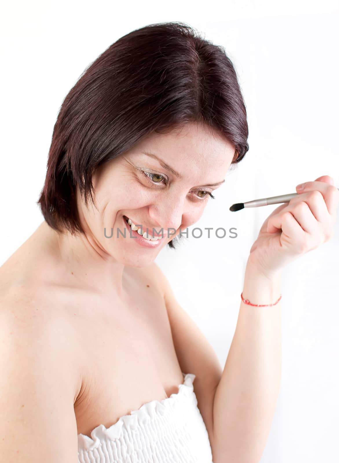 woman applying makeup by Dessie_bg