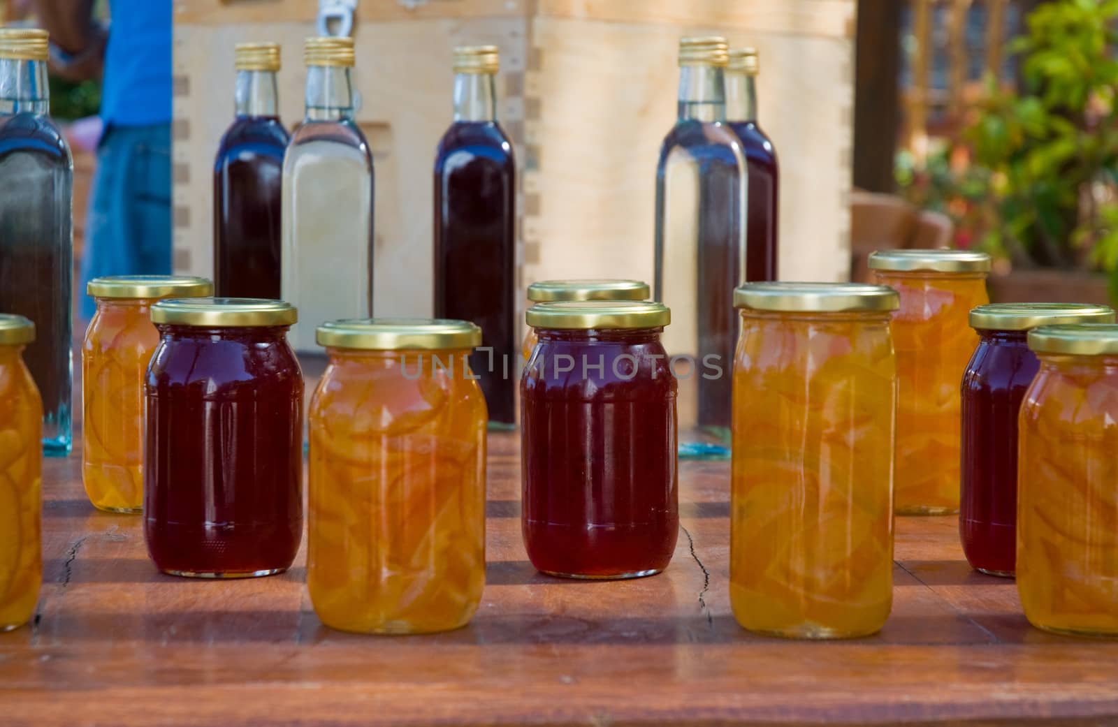 Jam at bank and liquors in bottles.
Market in Greece.