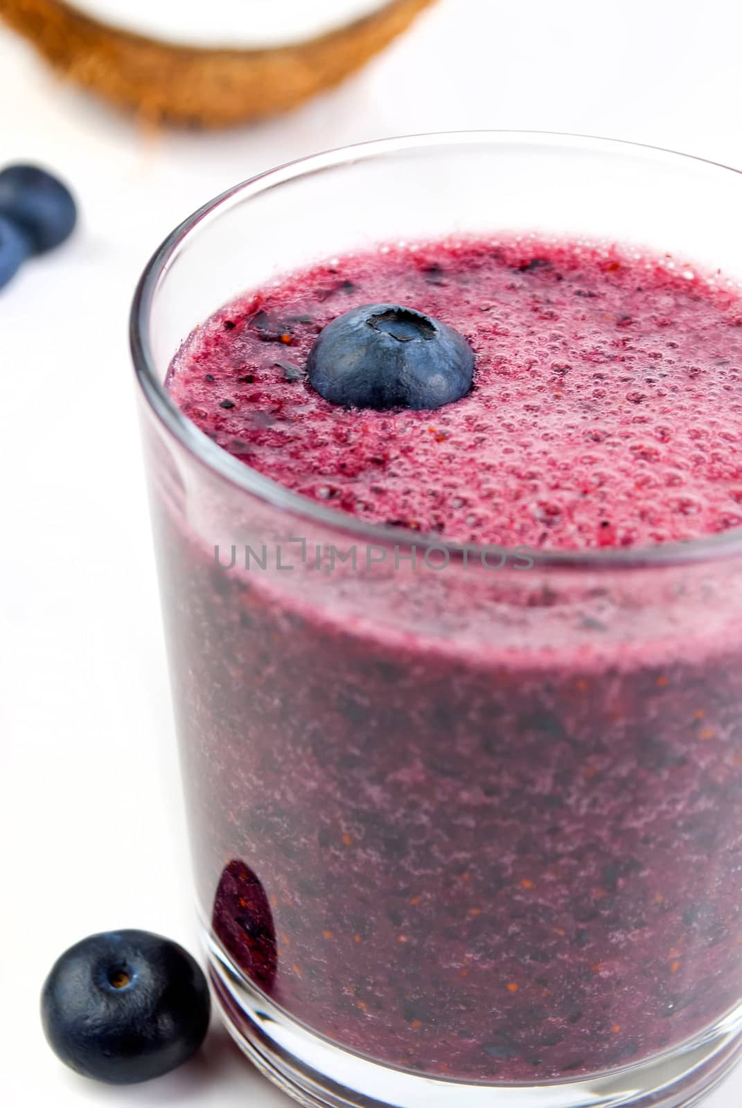 healthy blueberry smoothie isolated on white background