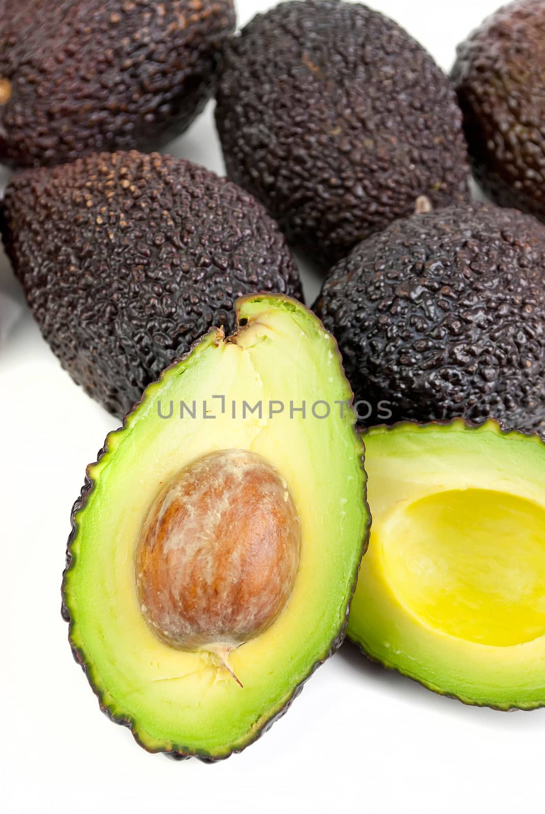 fresh organic healthy avocado fruit isolated on white background