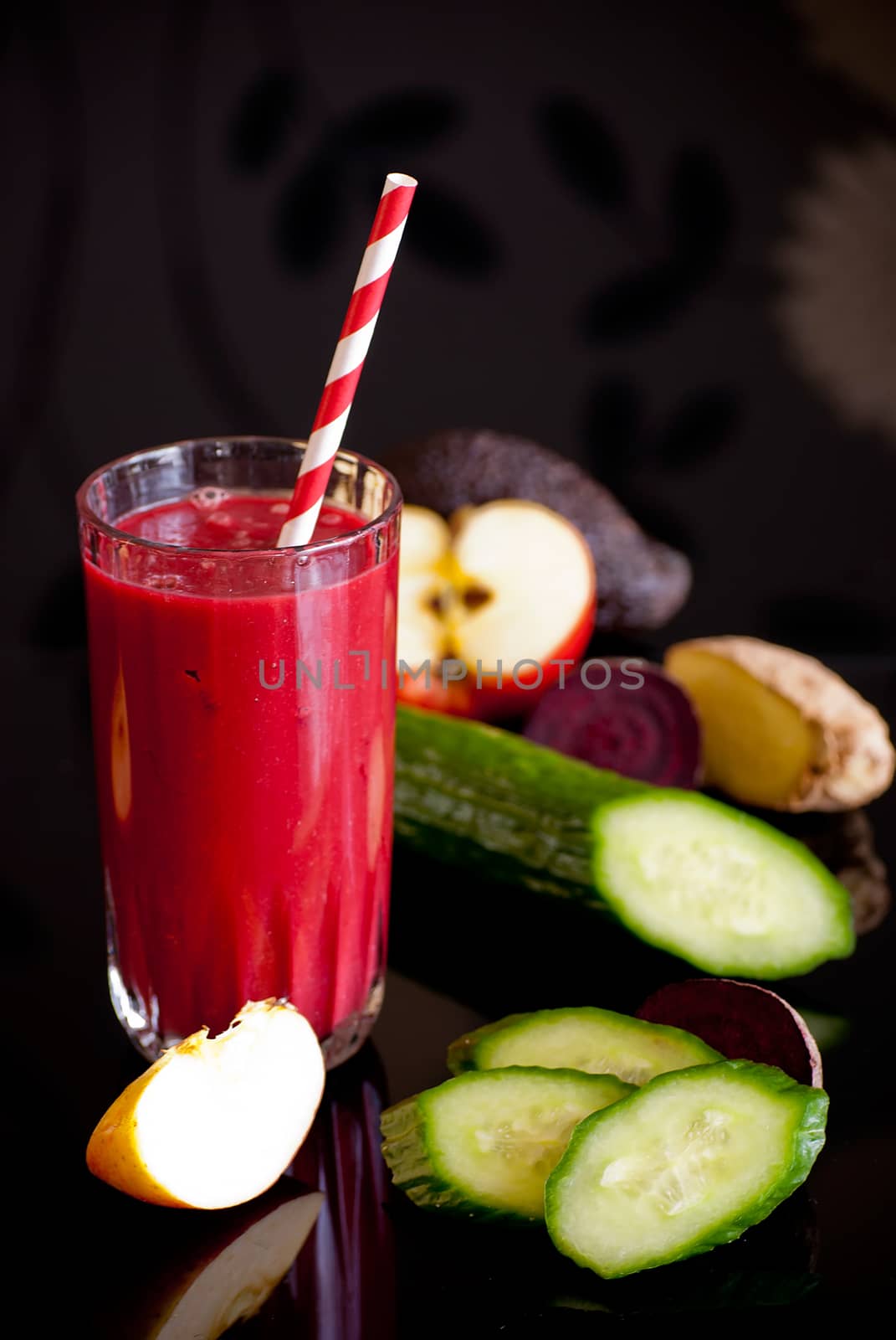 healthy juice made of variety fresh organic fruits and vegetables