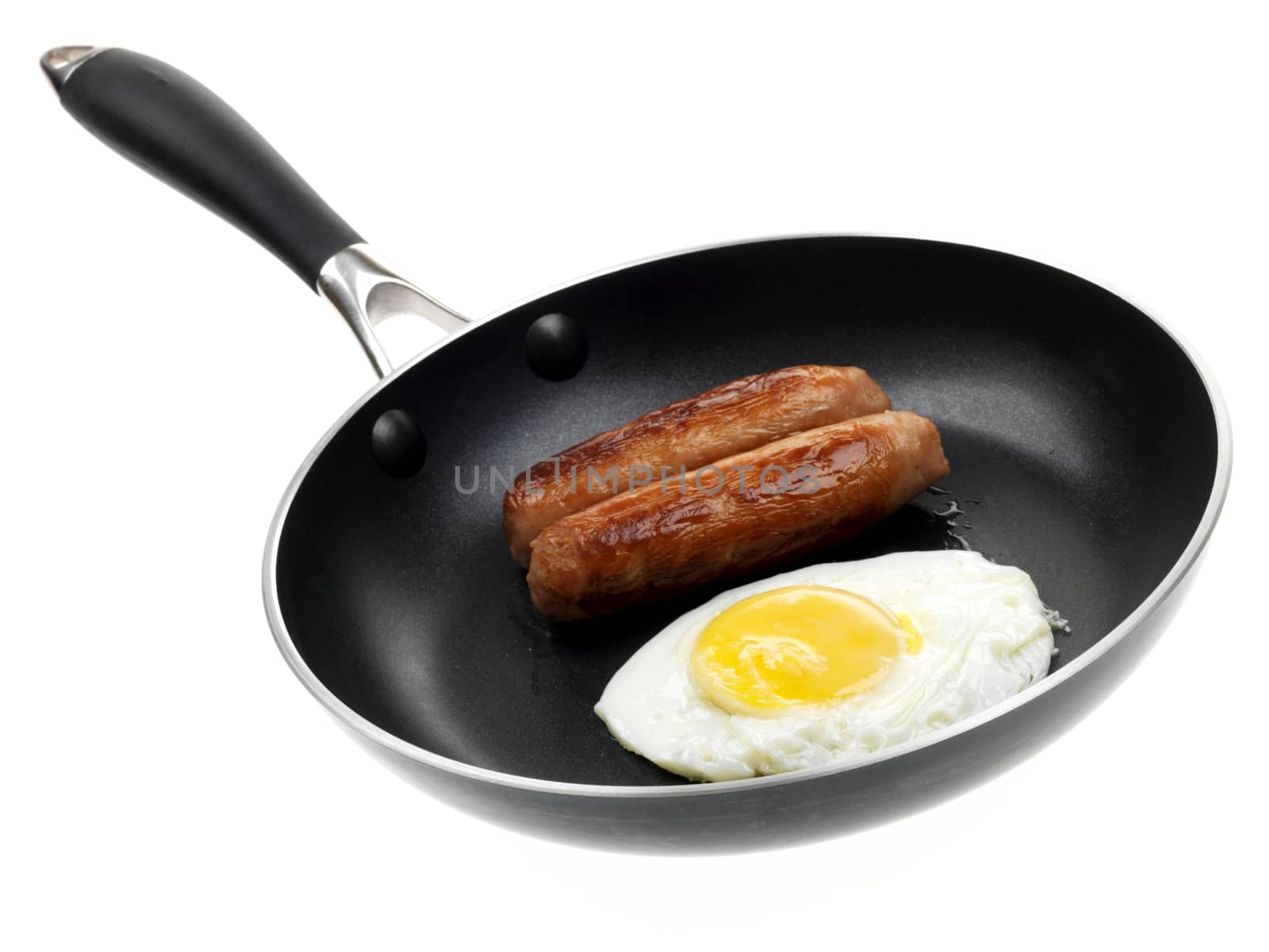 Frying Sausages and Egg by Whiteboxmedia