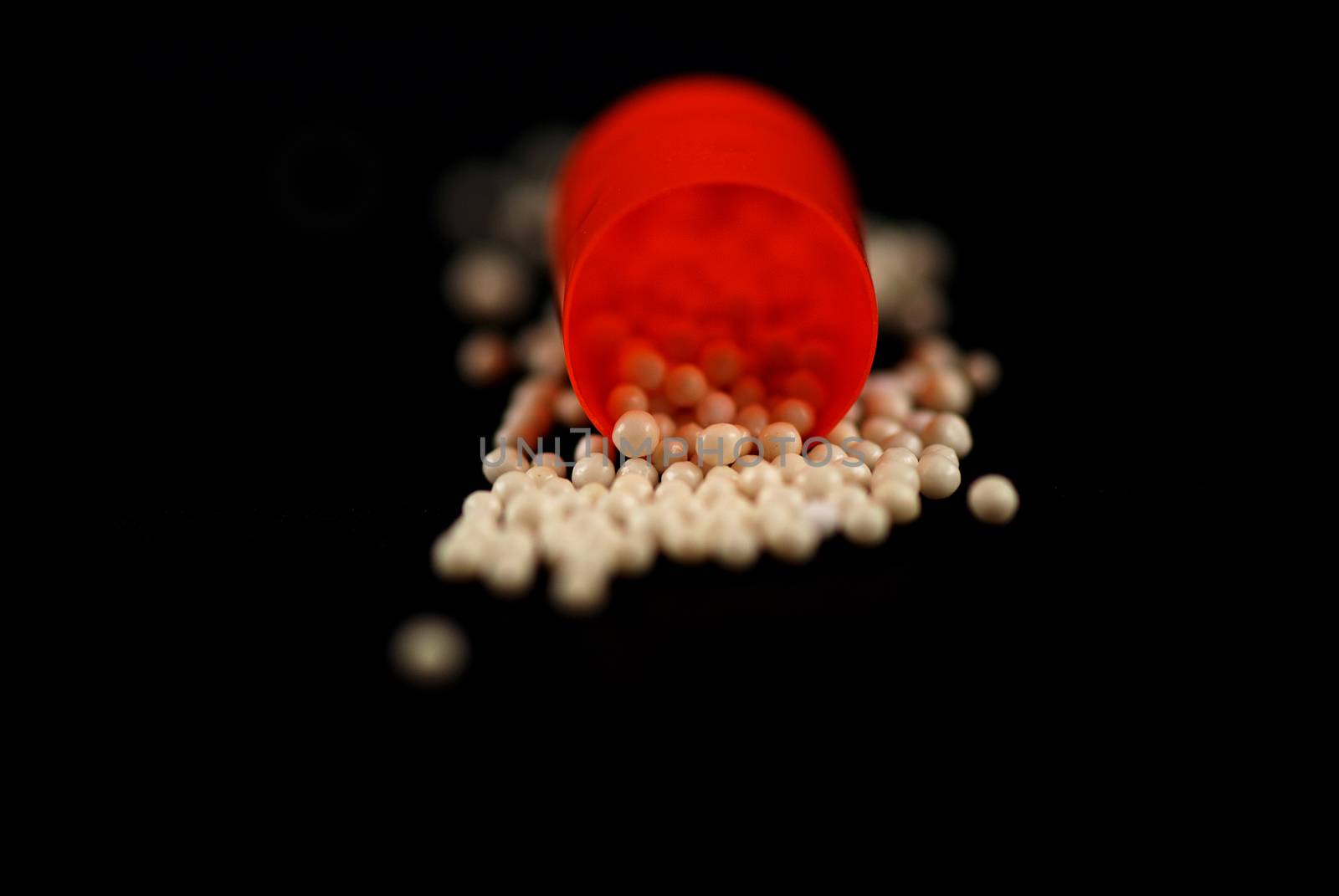 pictures of capsule pills showing the medicine inside it