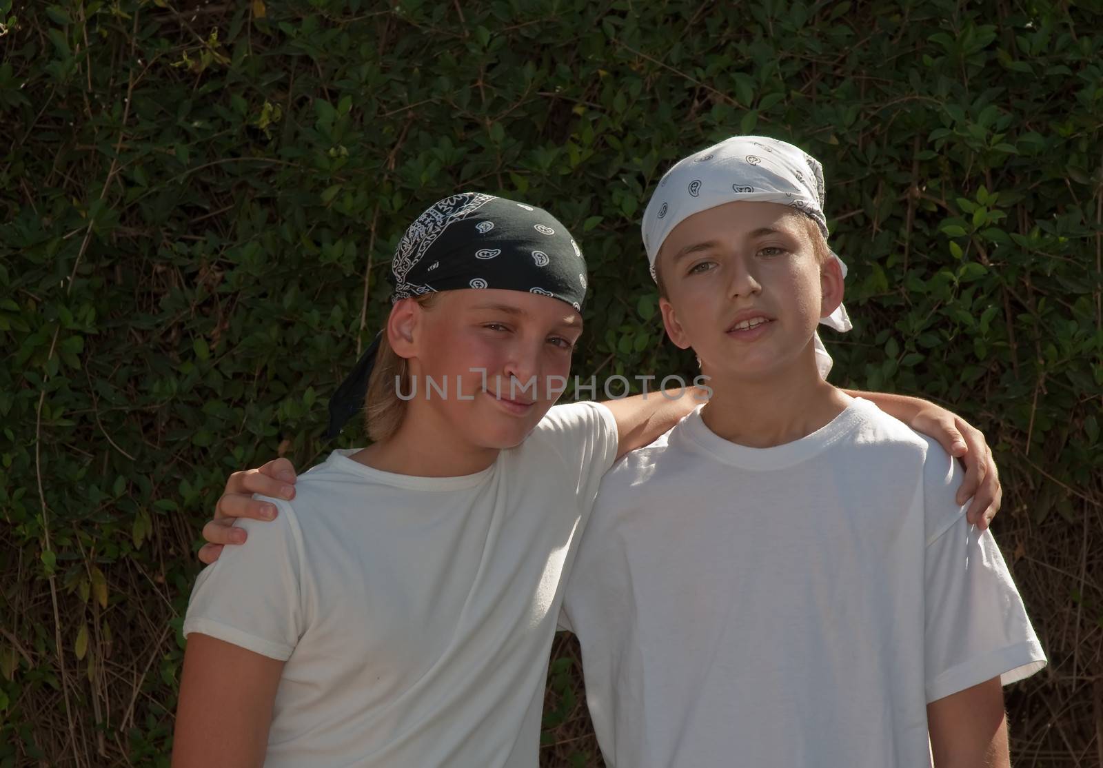 Portrait of two boys,  brothers and best friends smiling.