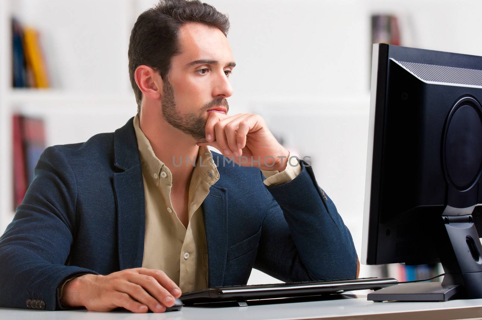 Man Looking At A Computer Monitor by ruigsantos