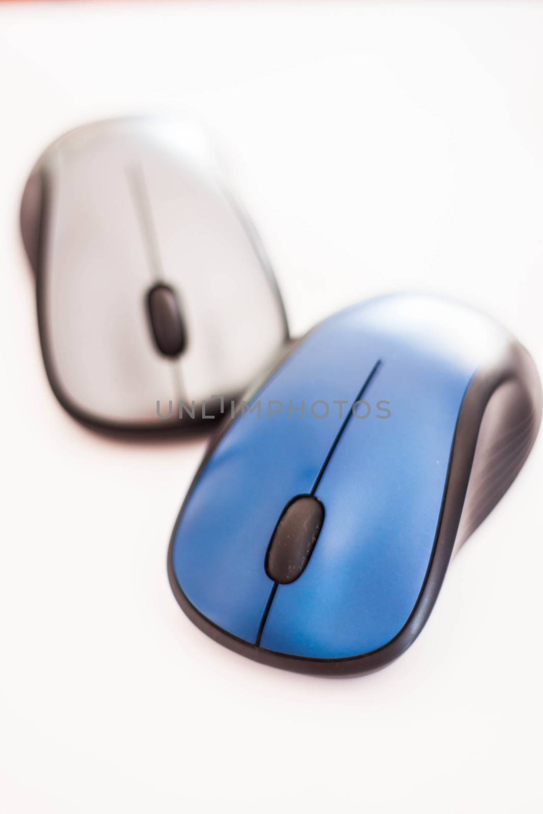 Blue and gray wireless mouse isolated on white background by punsayaporn