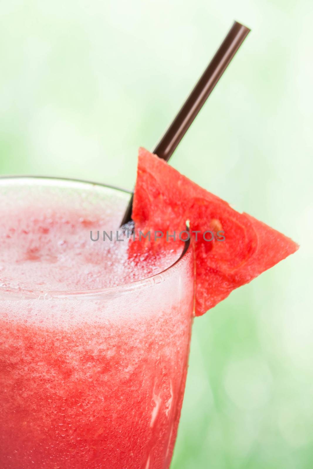 Close up red water melon fruit juice frappe by punsayaporn
