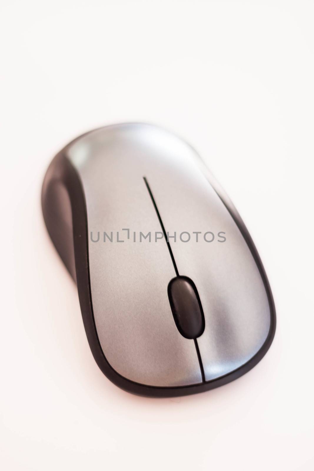 Silver wireless mouse isolated on white background by punsayaporn