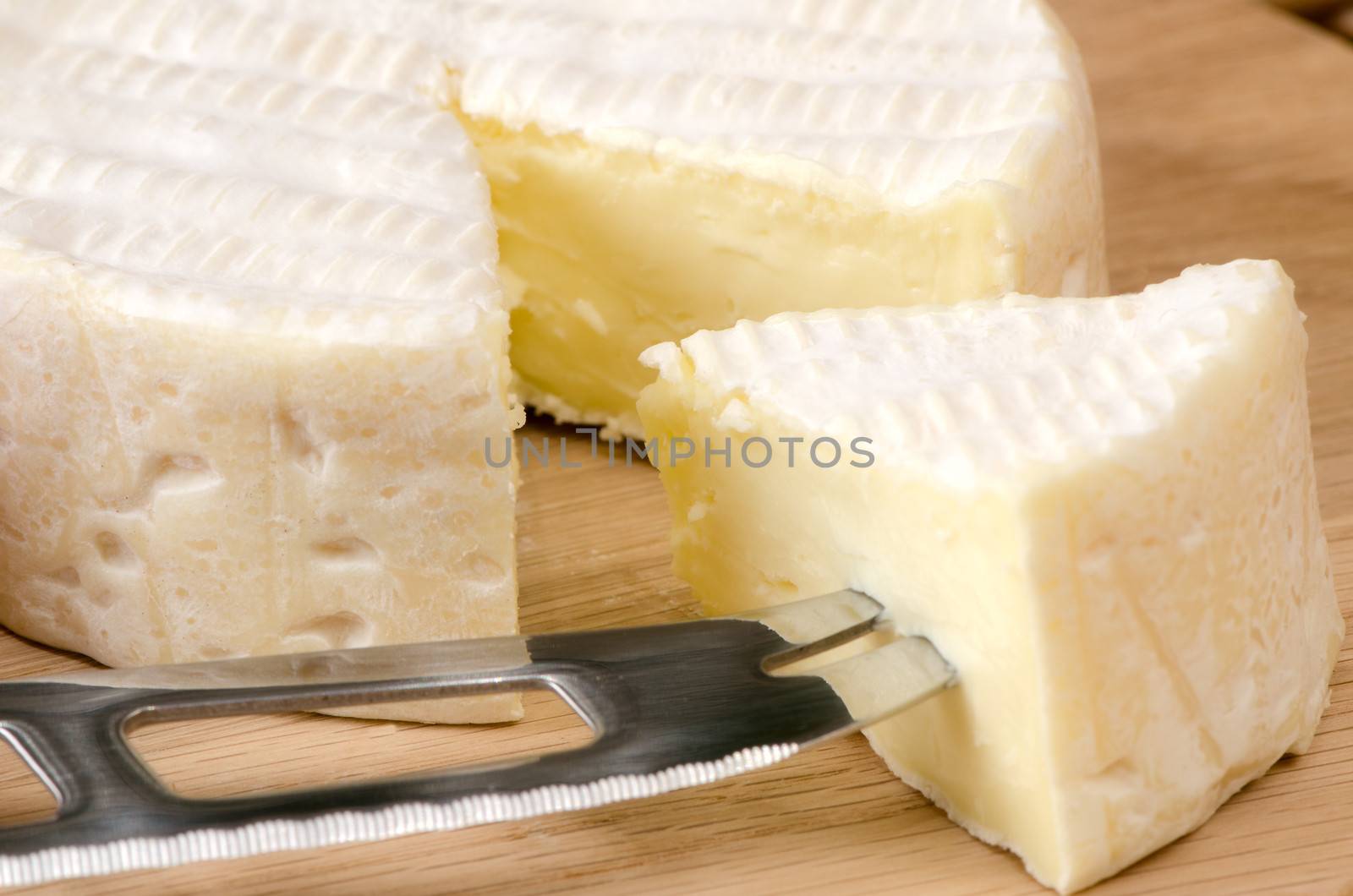 French cheese on a wooden board.