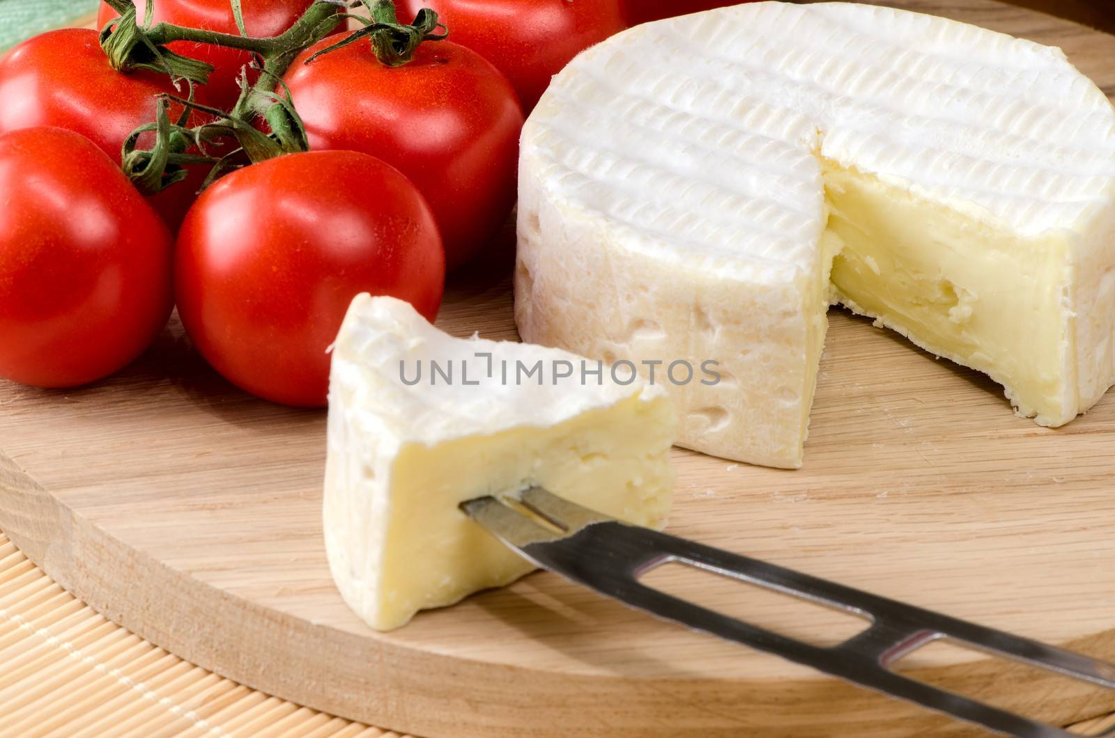 French cheese on a wooden board.