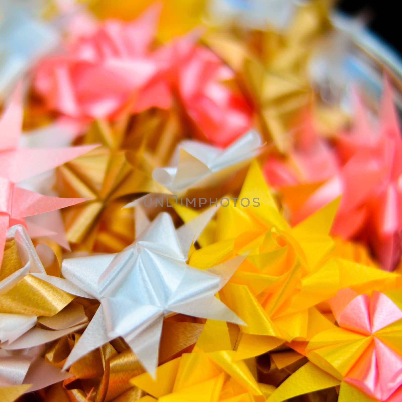 Origami ribbons flower and star shape
