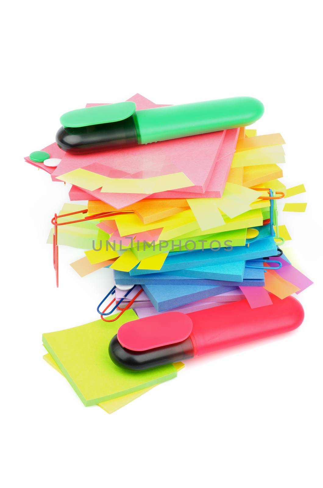 Stack of Adhesive Notes, Paper Clip, Sticky, Fastener, Clips and Felt Tip Pens isolated on white background