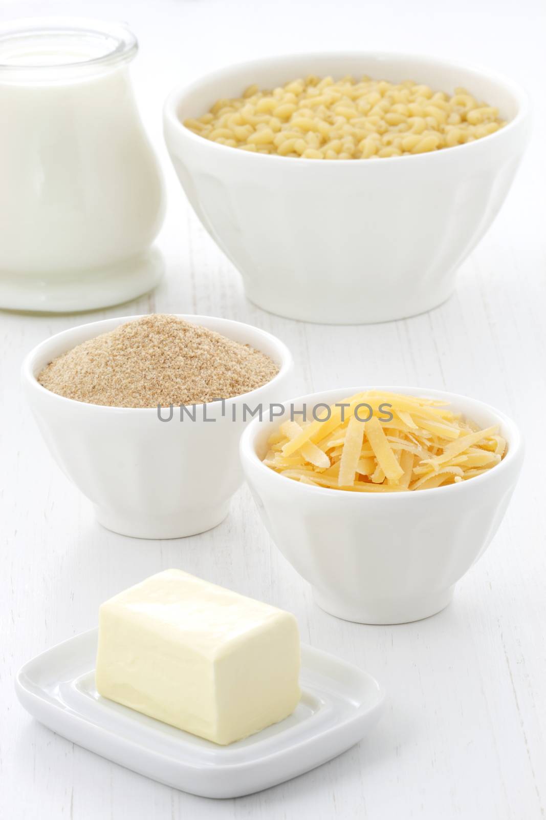 Delicious macaroni and cheese ingredients with a smooth milk cream, fine bread crumbs and aged cheddar cheese. Almost every kid and adult will love it at once. 