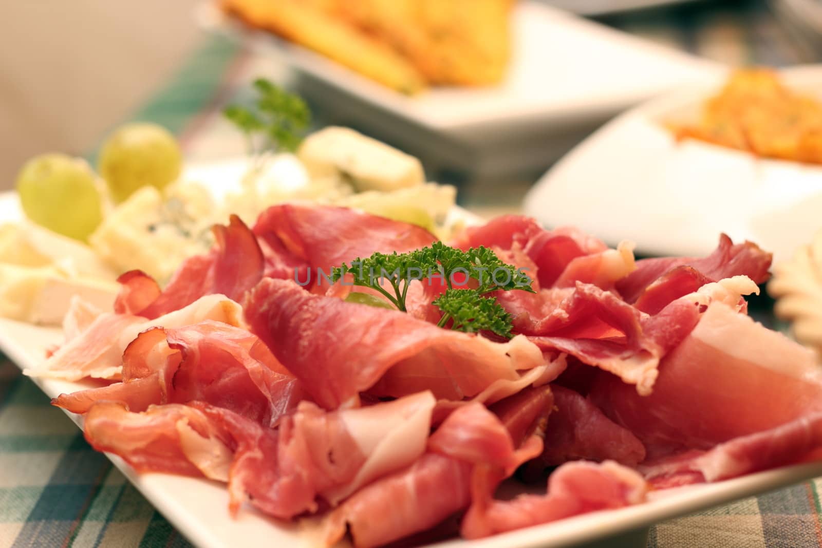 slices of fresh bacon served on white plate