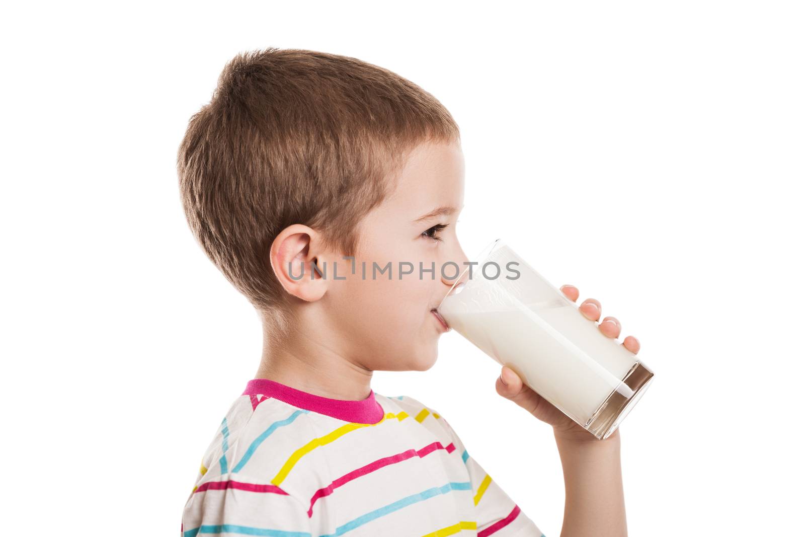 Beauty smiling child boy hand holding milk drink glass white isolated