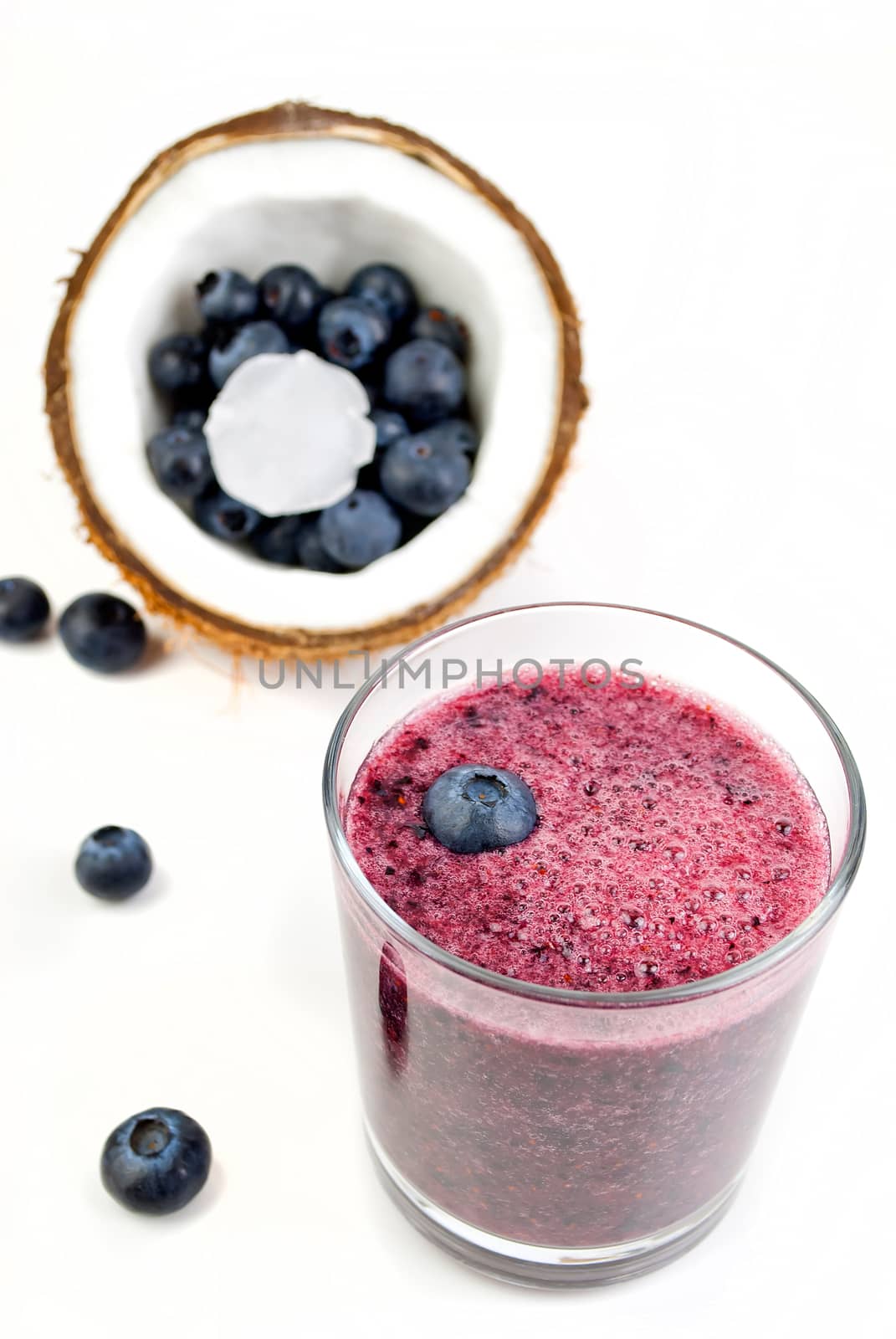 healthy blueberry smoothie isolated on white background