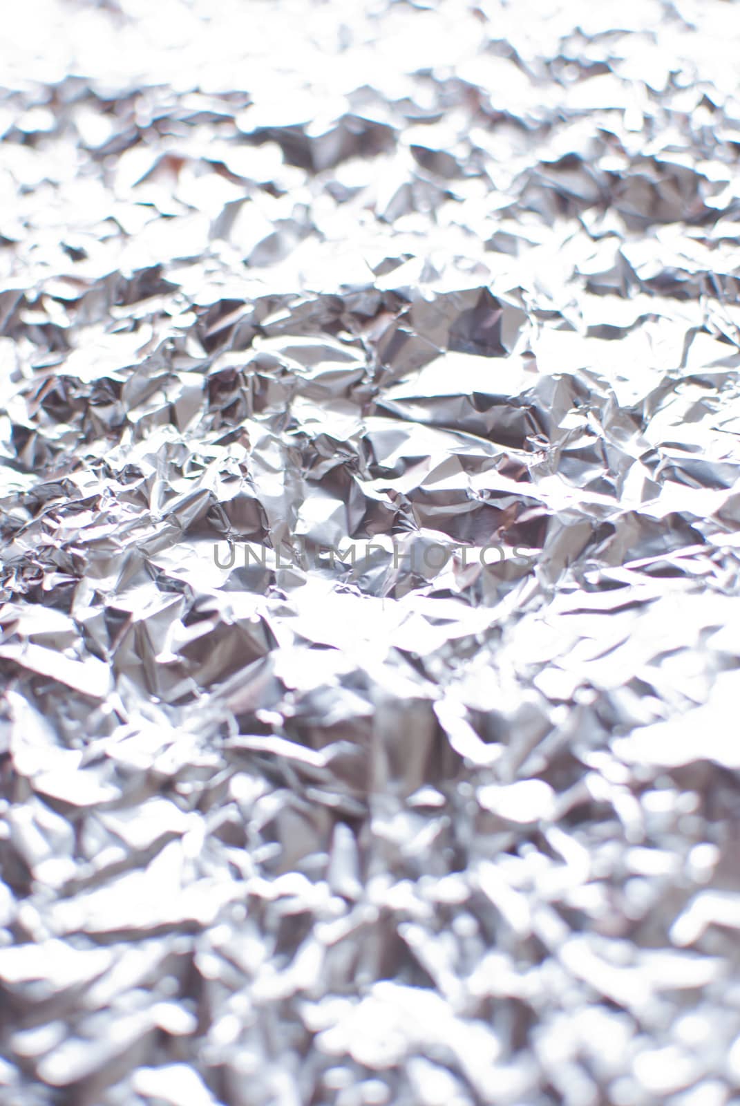 abstract silver rough wrinkle foil texture background