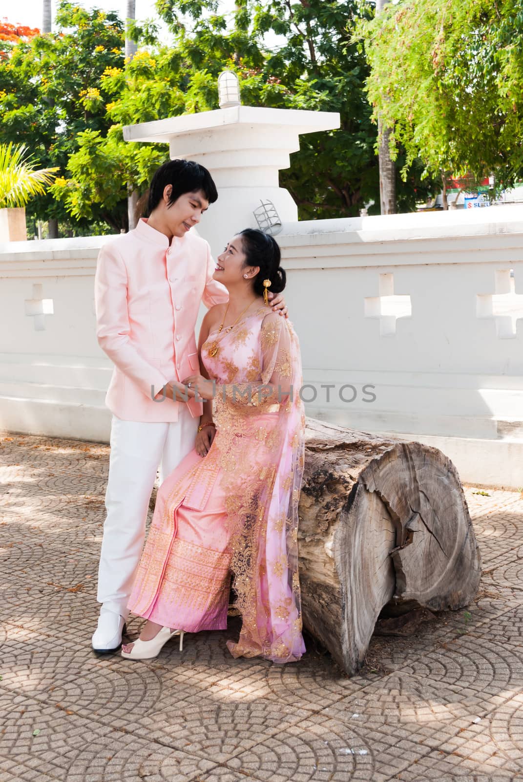 Asian Thai Groom Looking Cute Bride in Happiness by noneam