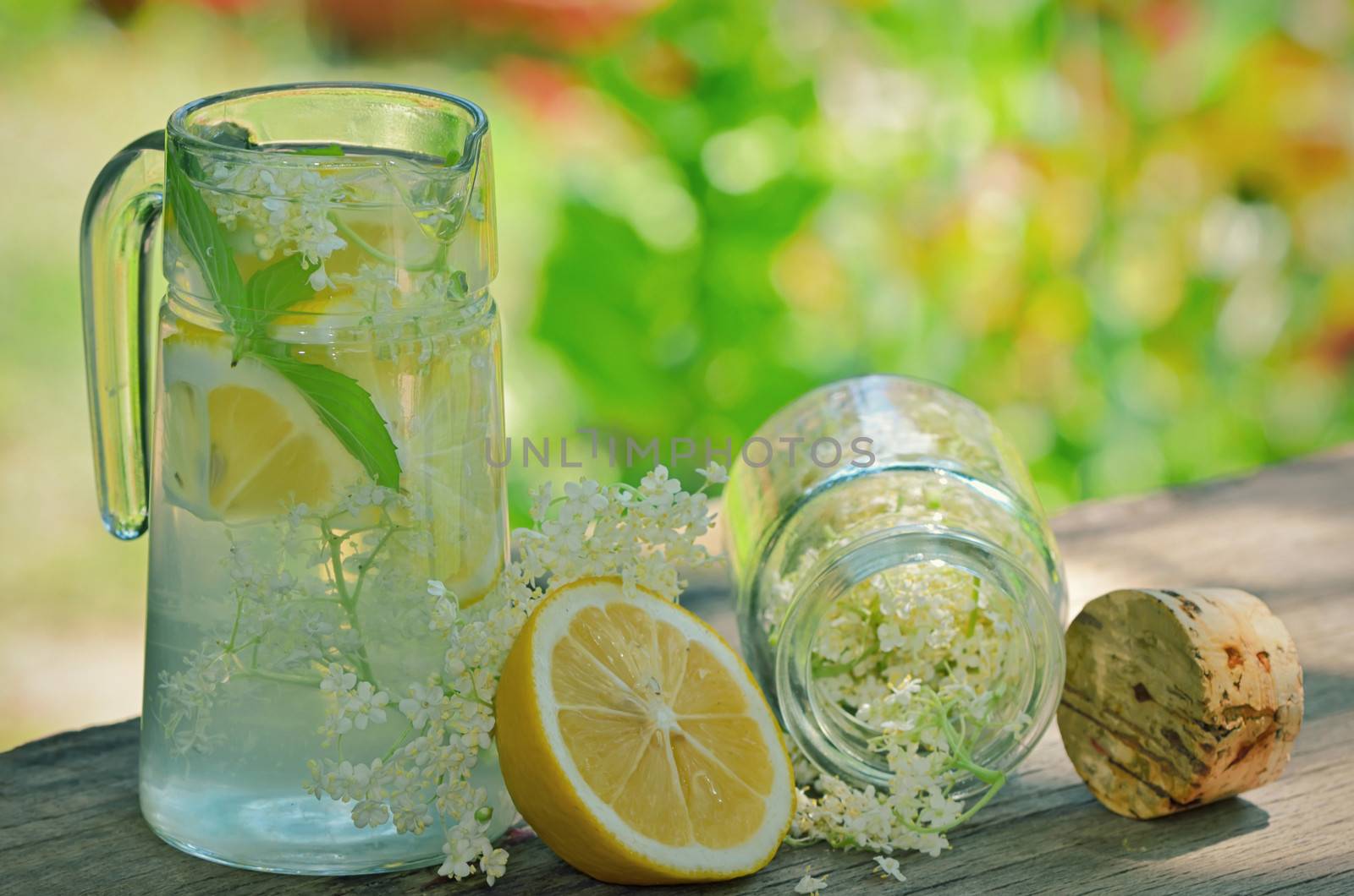 elderflower juice on wooden background