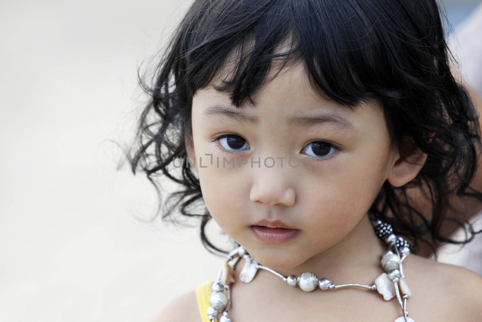 Portrait of the beautiful small Asian girl. Indonesia. Java