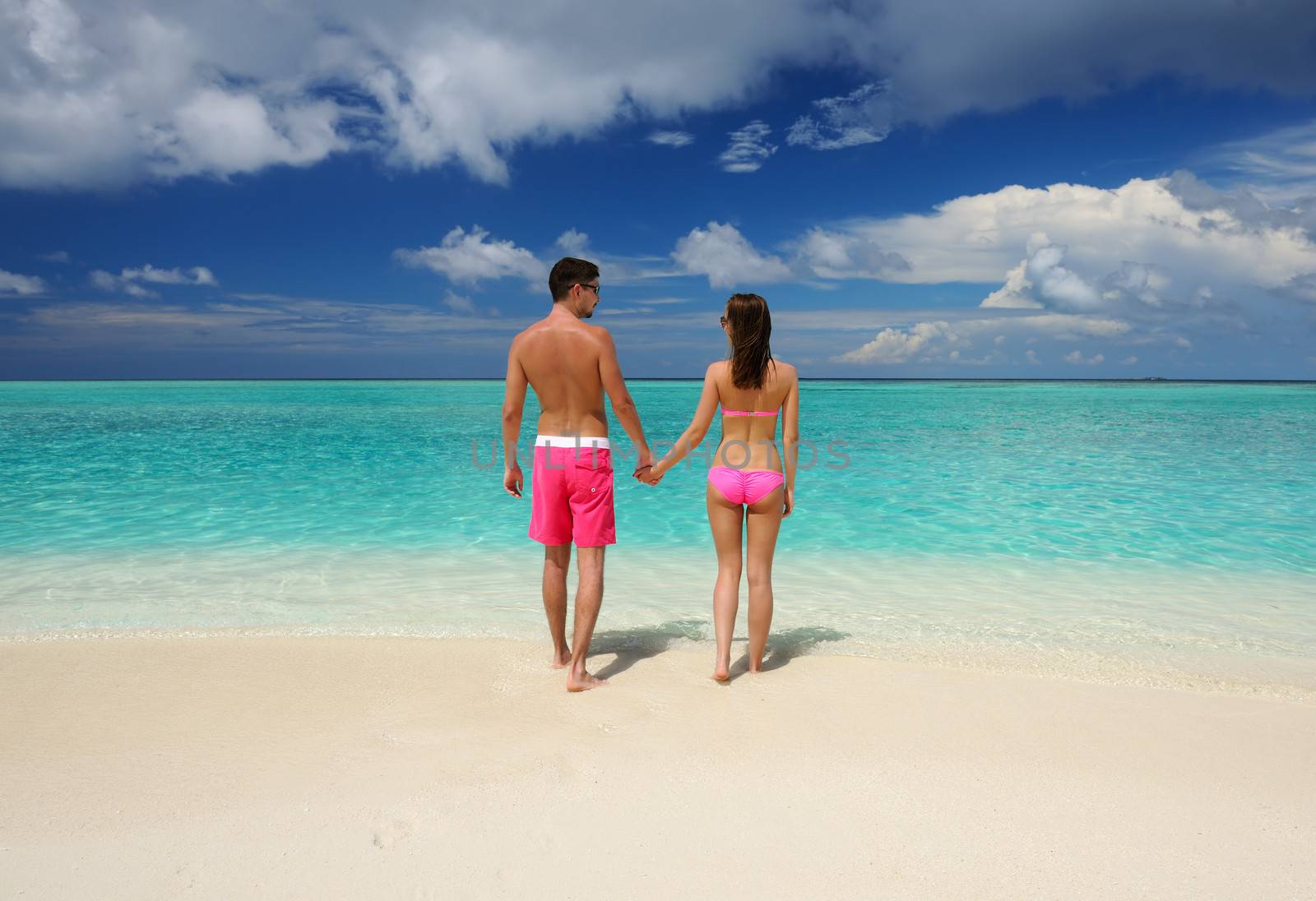 Couple on a tropical beach at Maldives