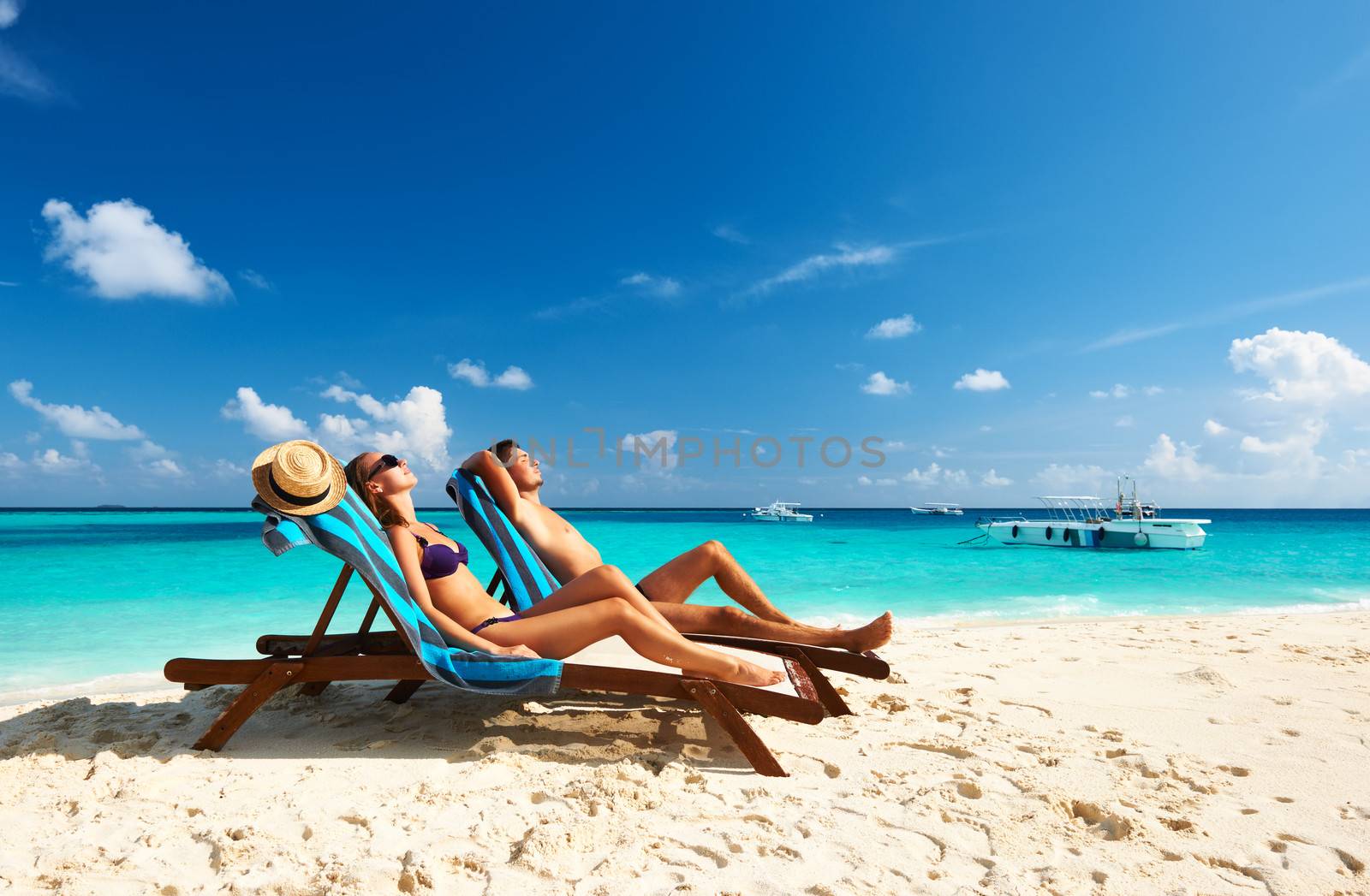 Couple on a tropical beach at Maldives