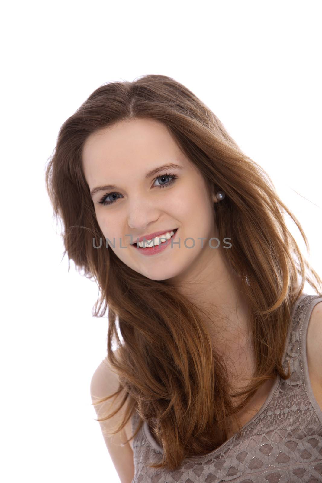 Portrait of a beautiful young woman with long brunette hair looking at the camera with a smile isolated on white
