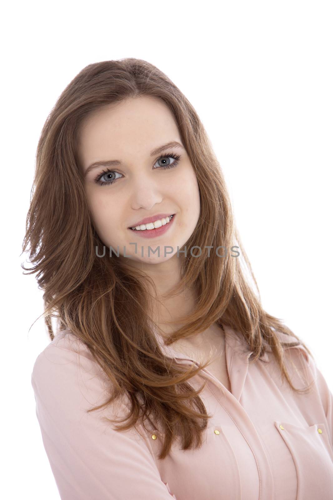 Portrait of a beautiful teenaged woman with a gentle smile looking at the camera, isolated on white