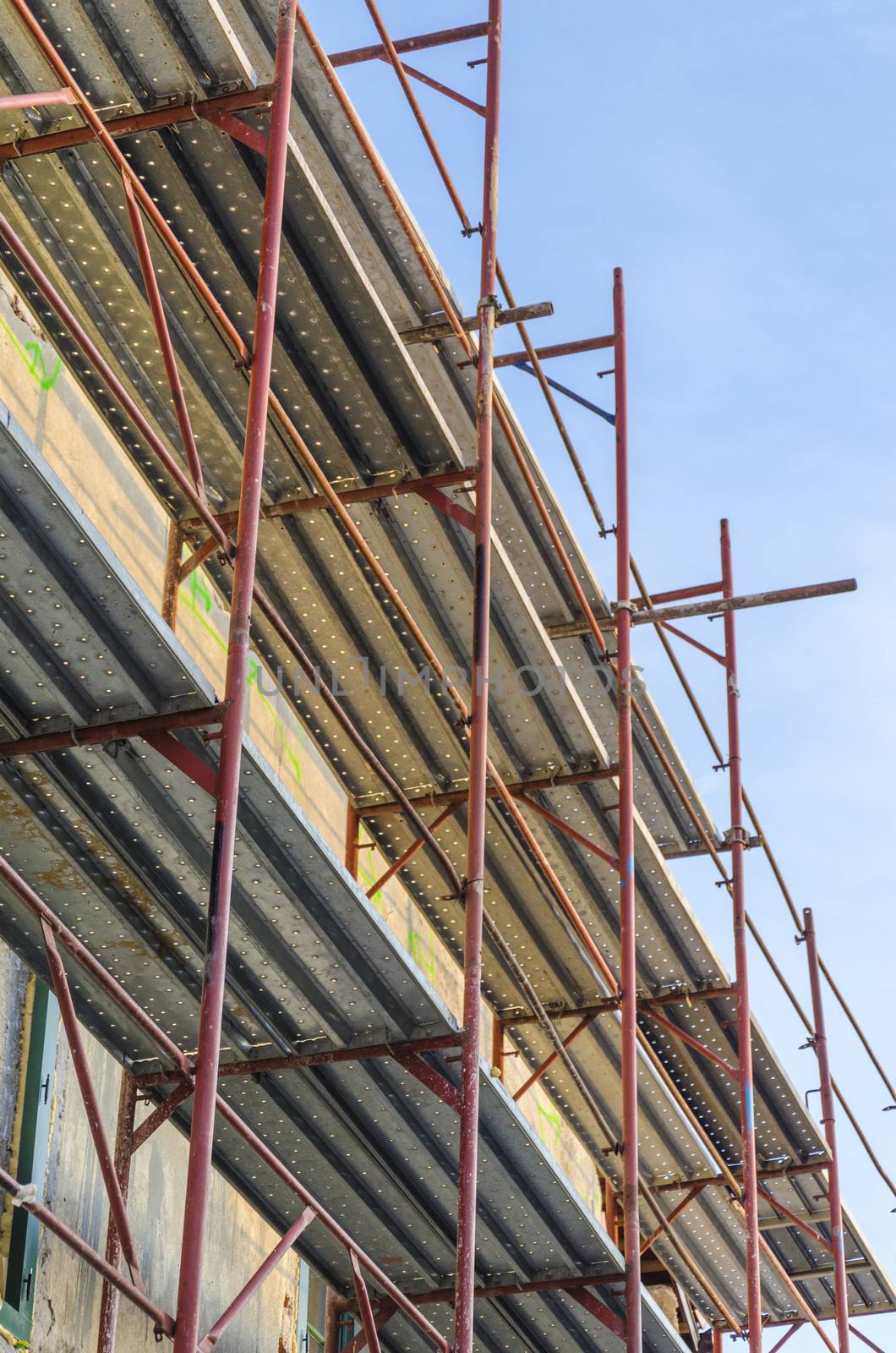 Scaffold surrounding old house during renovation works.