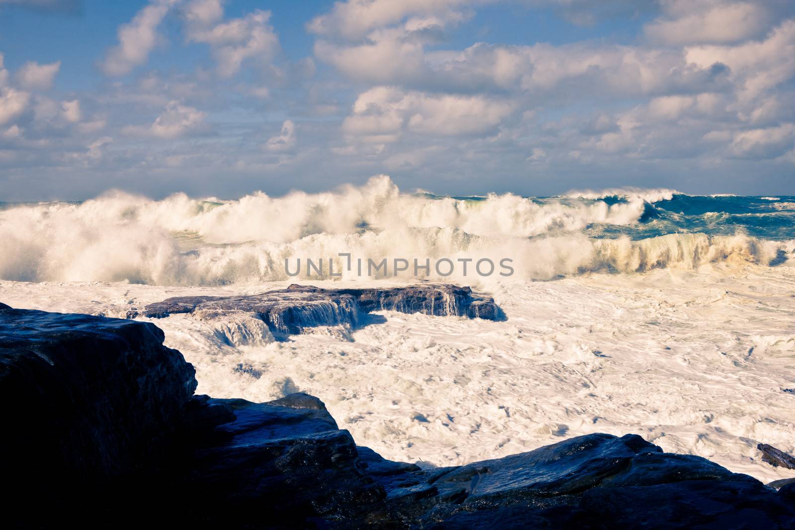 Huge breaking waves at Bondi Beach by jrstock