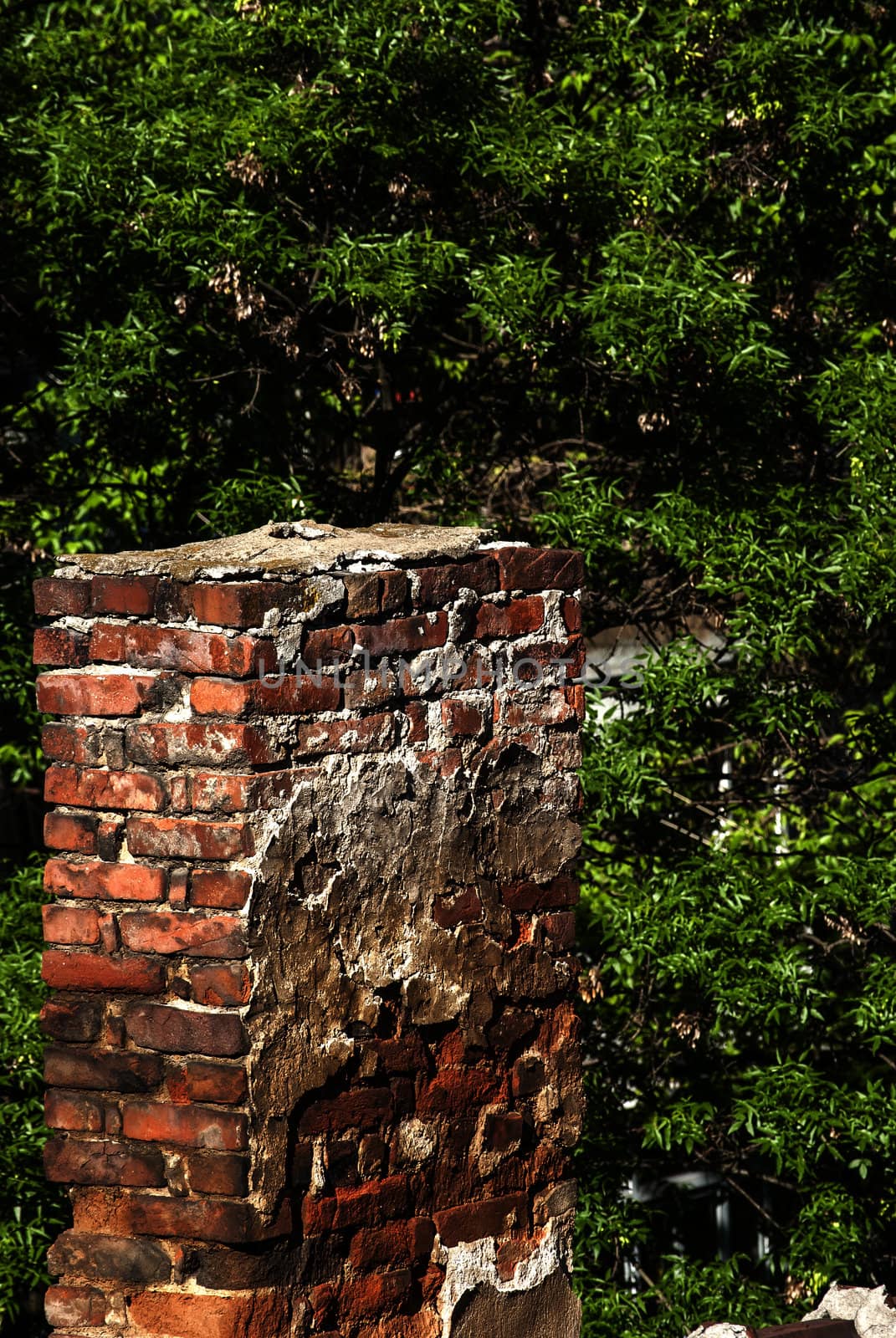 Old urban house roof with chimney