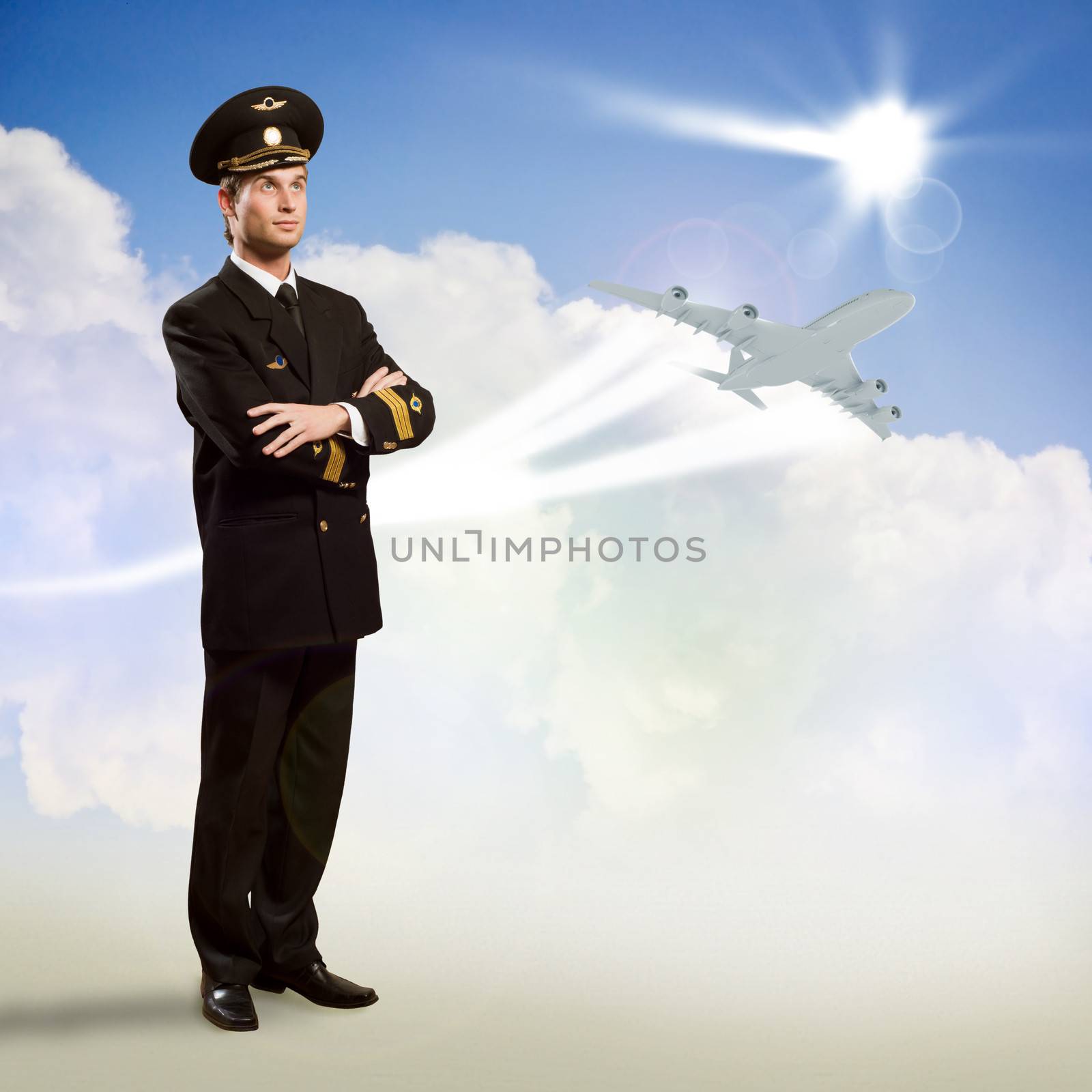 pilot is in the form of arms folded, against the sky, the clouds and the plane