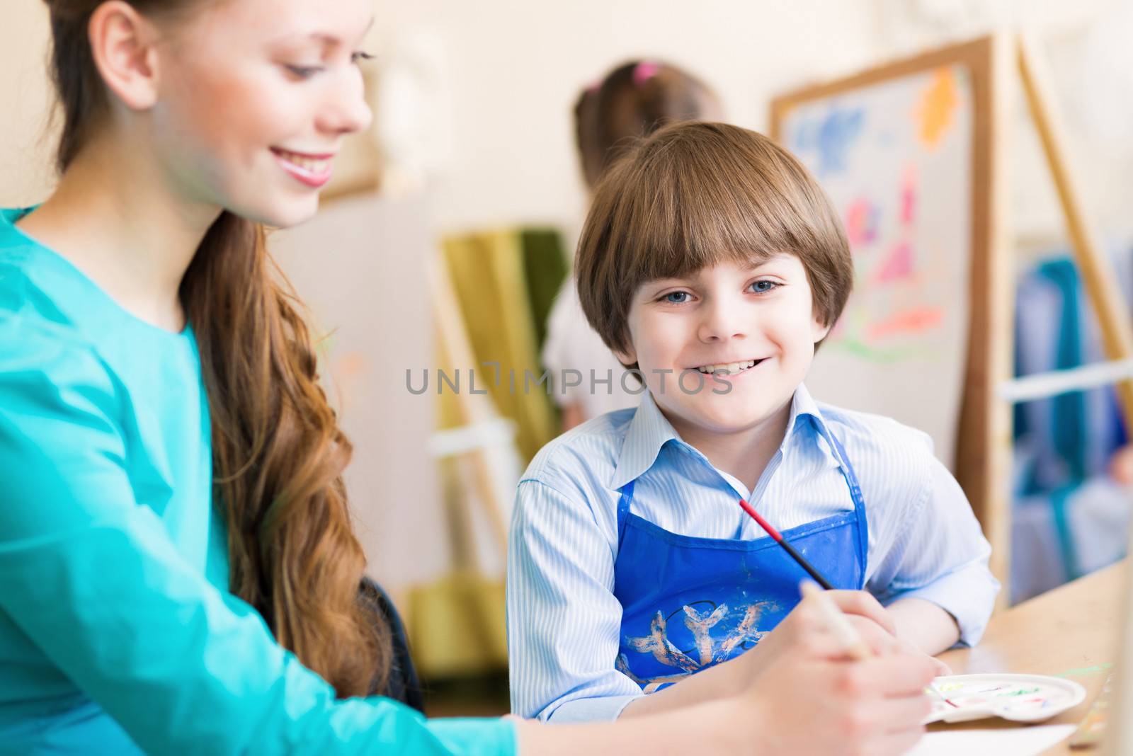 teacher and student in the classroom by adam121